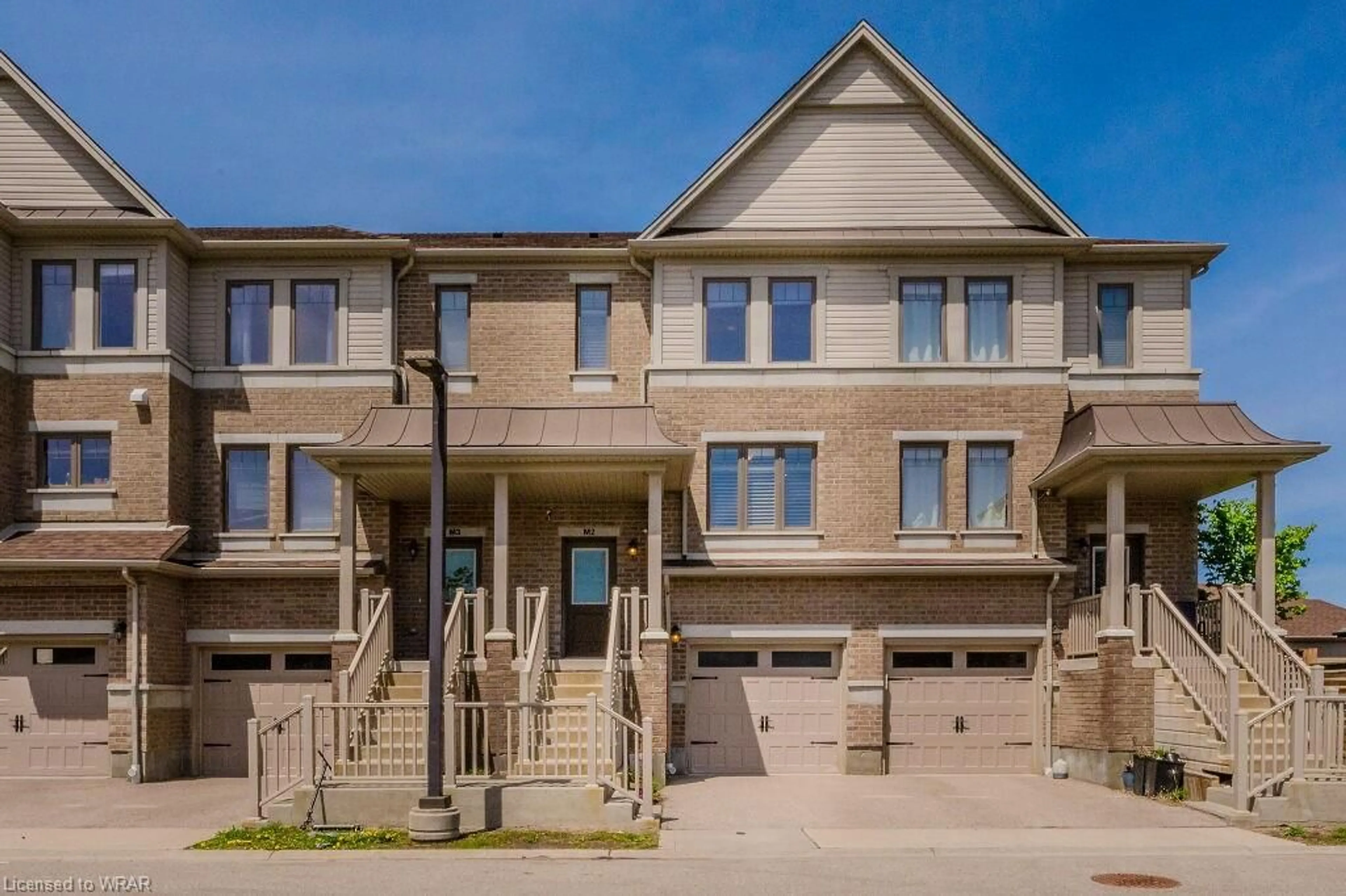 A pic from exterior of the house or condo for 70 Willowrun Dr #M2, Kitchener Ontario N2A 0J3