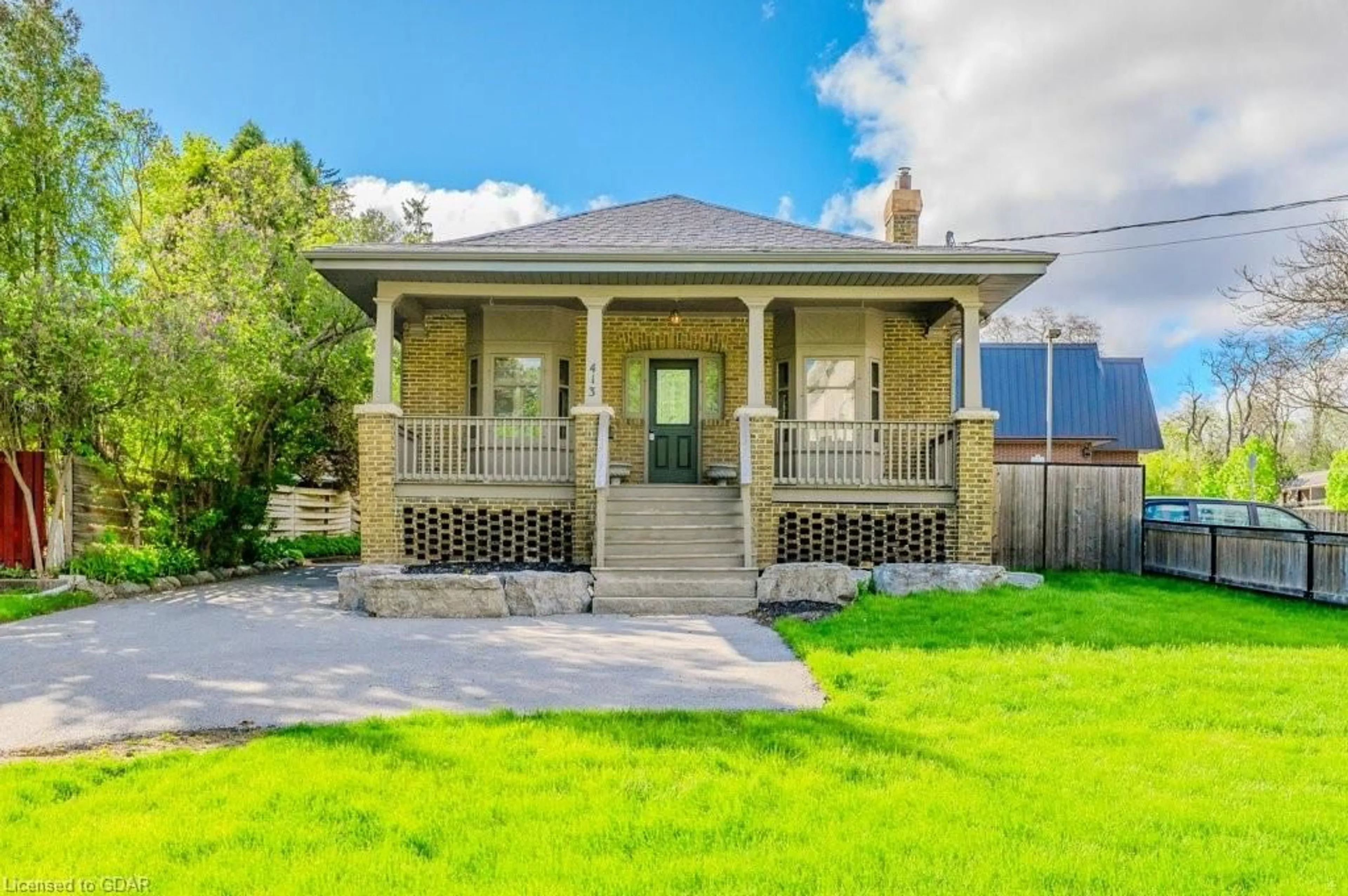 Frontside or backside of a home for 413 Waterloo Ave, Guelph Ontario N1H 3K3