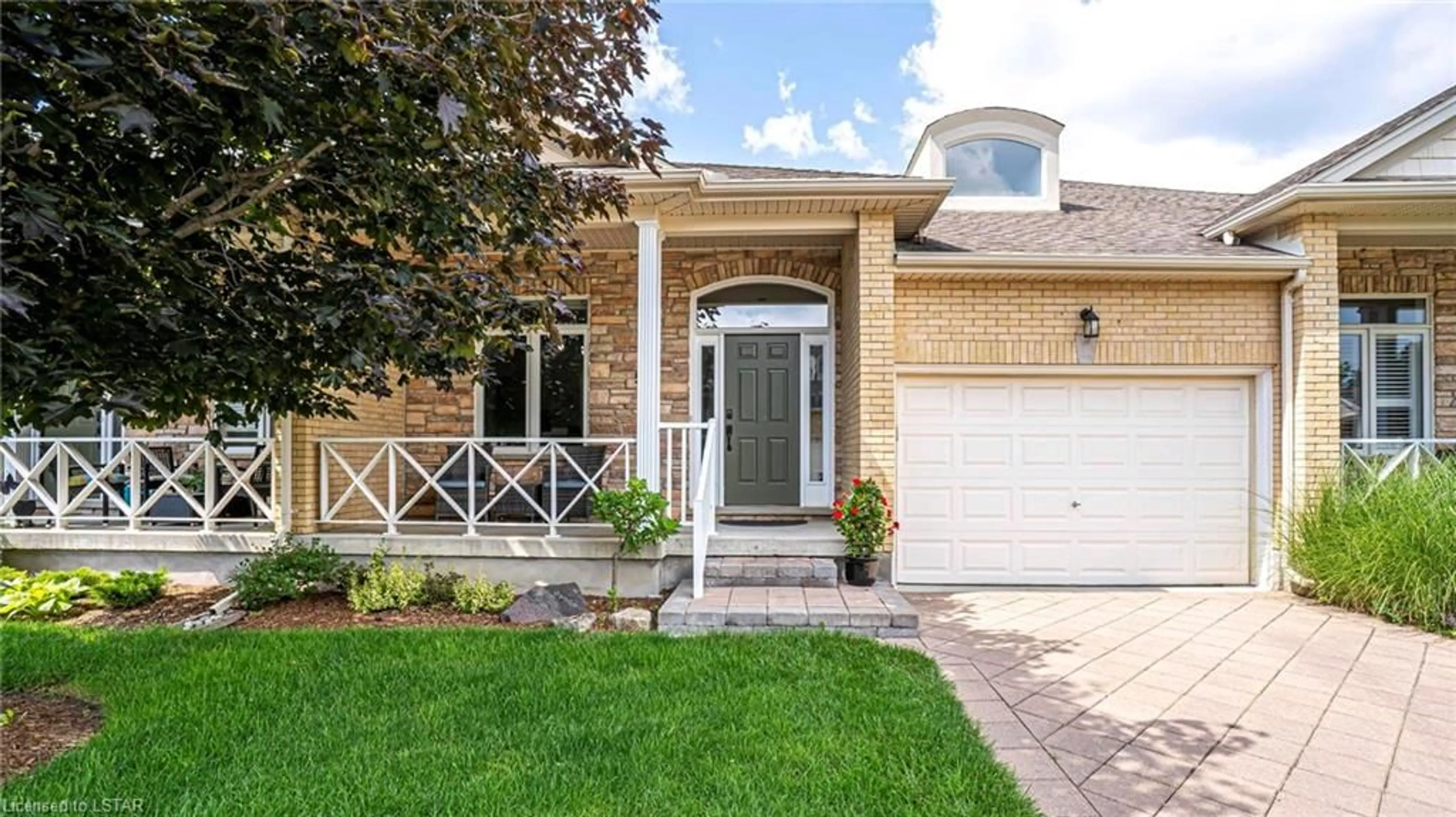 Home with brick exterior material for 947 Adirondack Rd #9, London Ontario N6K 4Y7