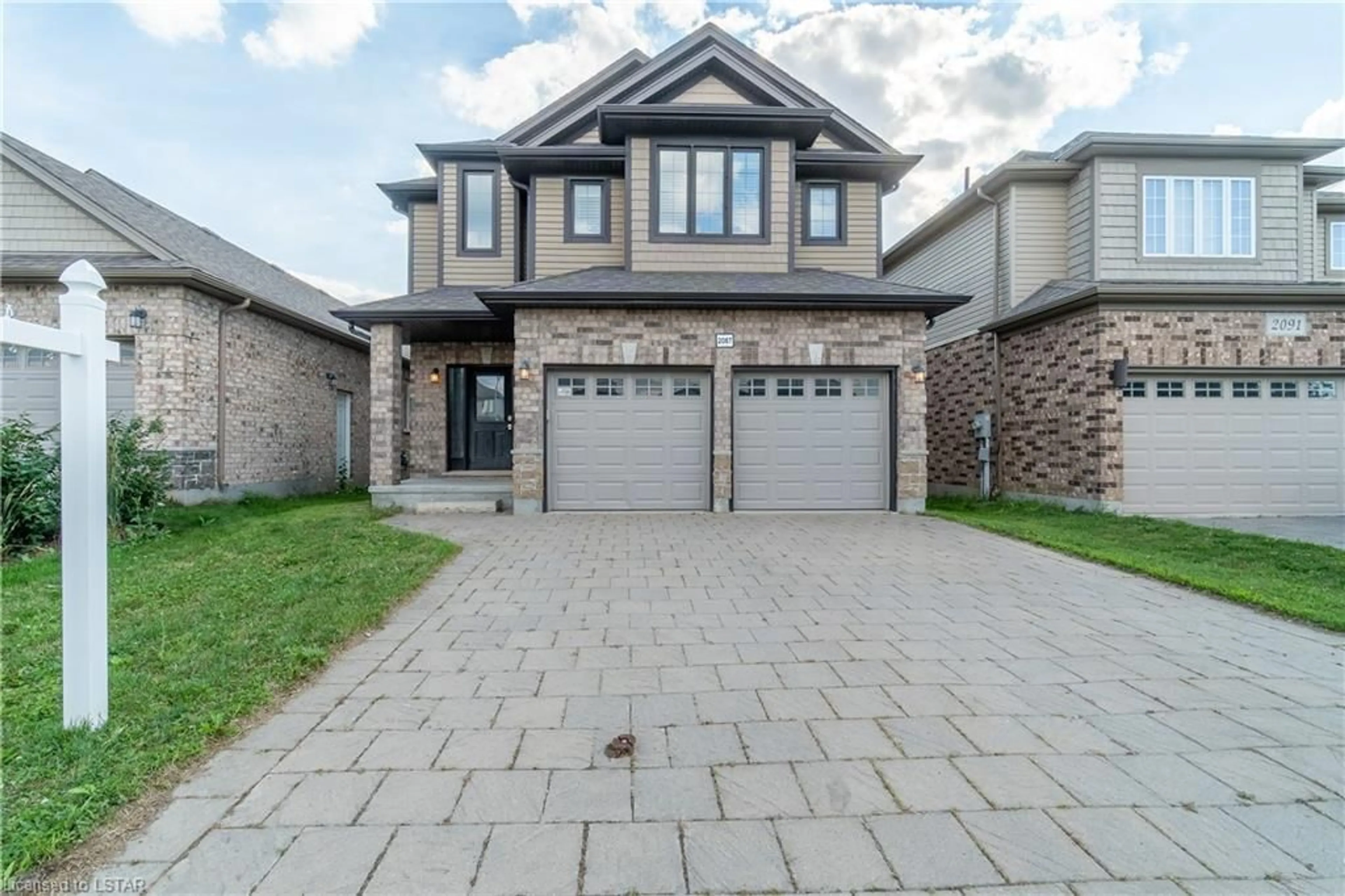 Frontside or backside of a home for 2087 Cherrywood Trail, London Ontario N6H 0C8