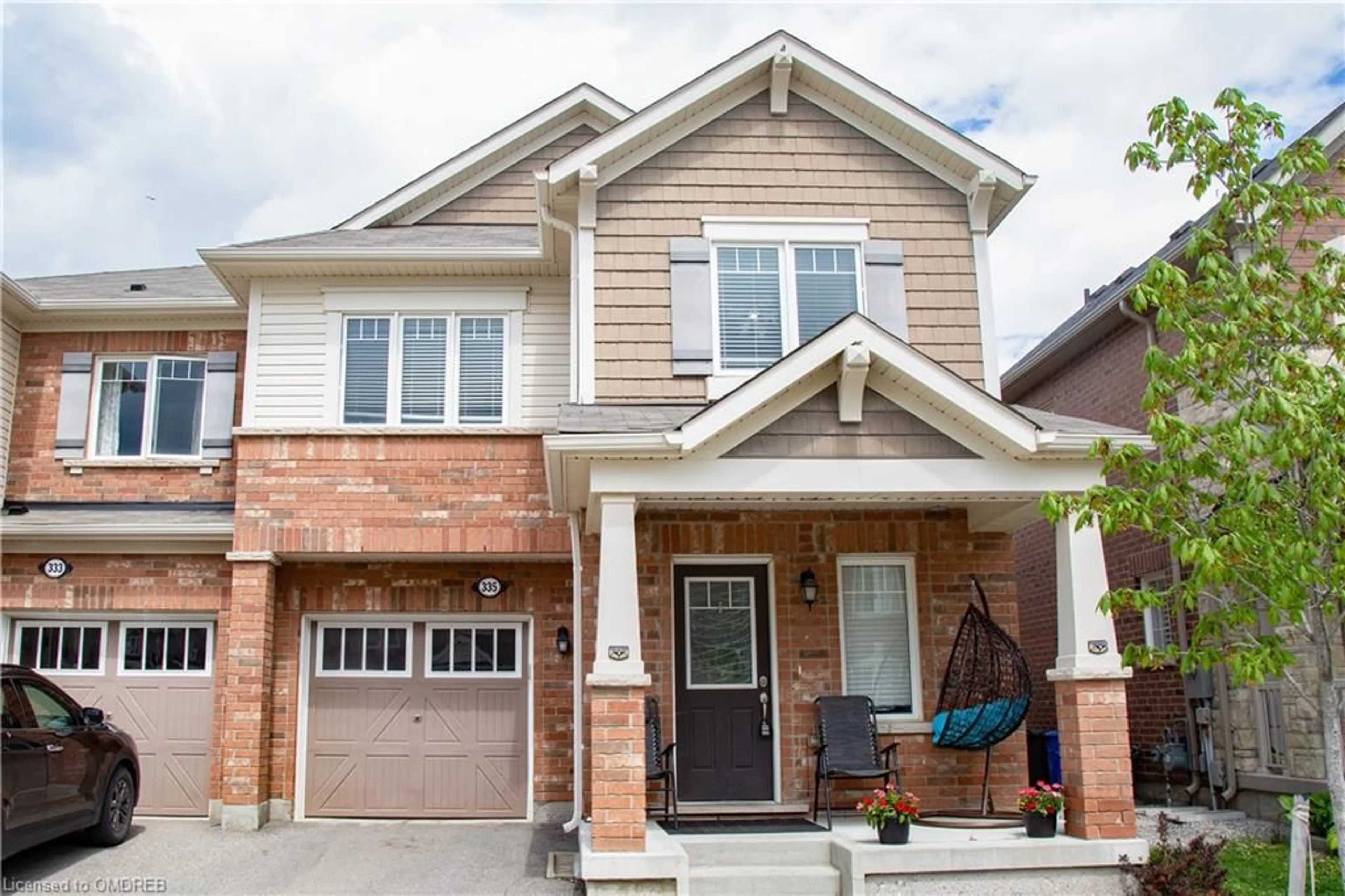 Home with brick exterior material for 335 Gooding Cres, Milton Ontario L9E 0A9