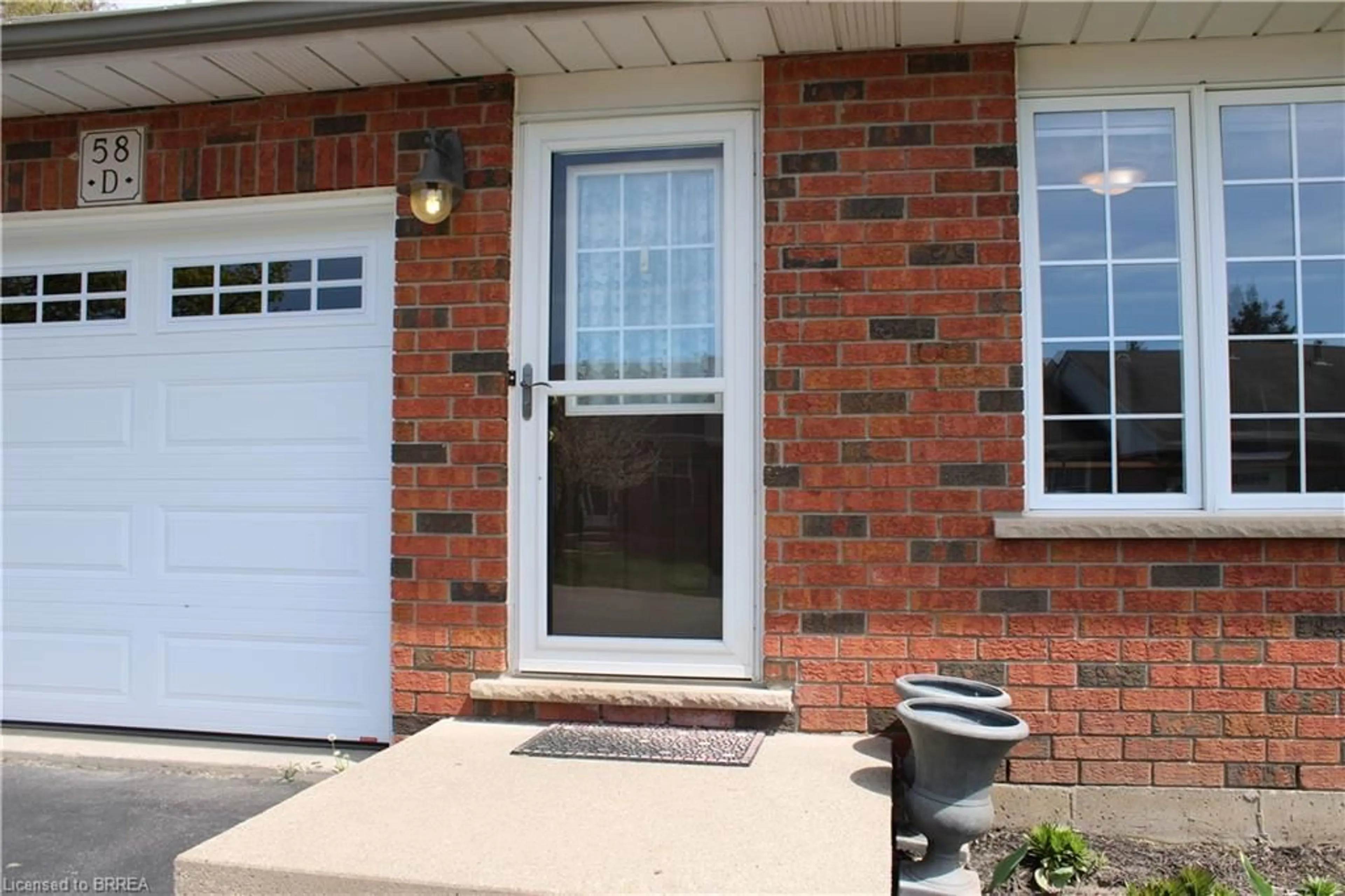 Home with brick exterior material for 58 Harris Ave #D, Brantford Ontario N3R 2E9