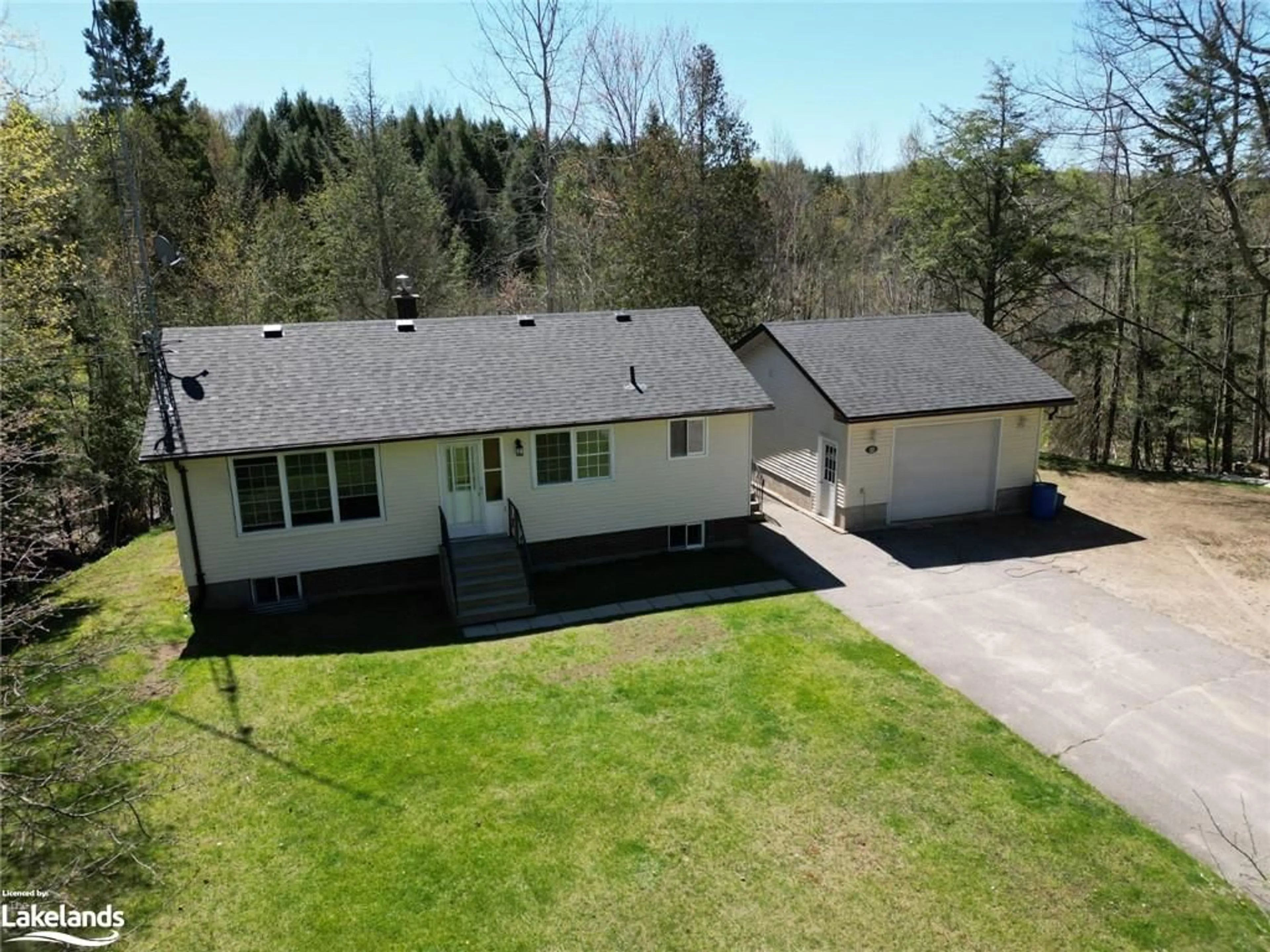 Frontside or backside of a home for 22 Mulholland Dr, Haliburton Ontario K0M 1S0