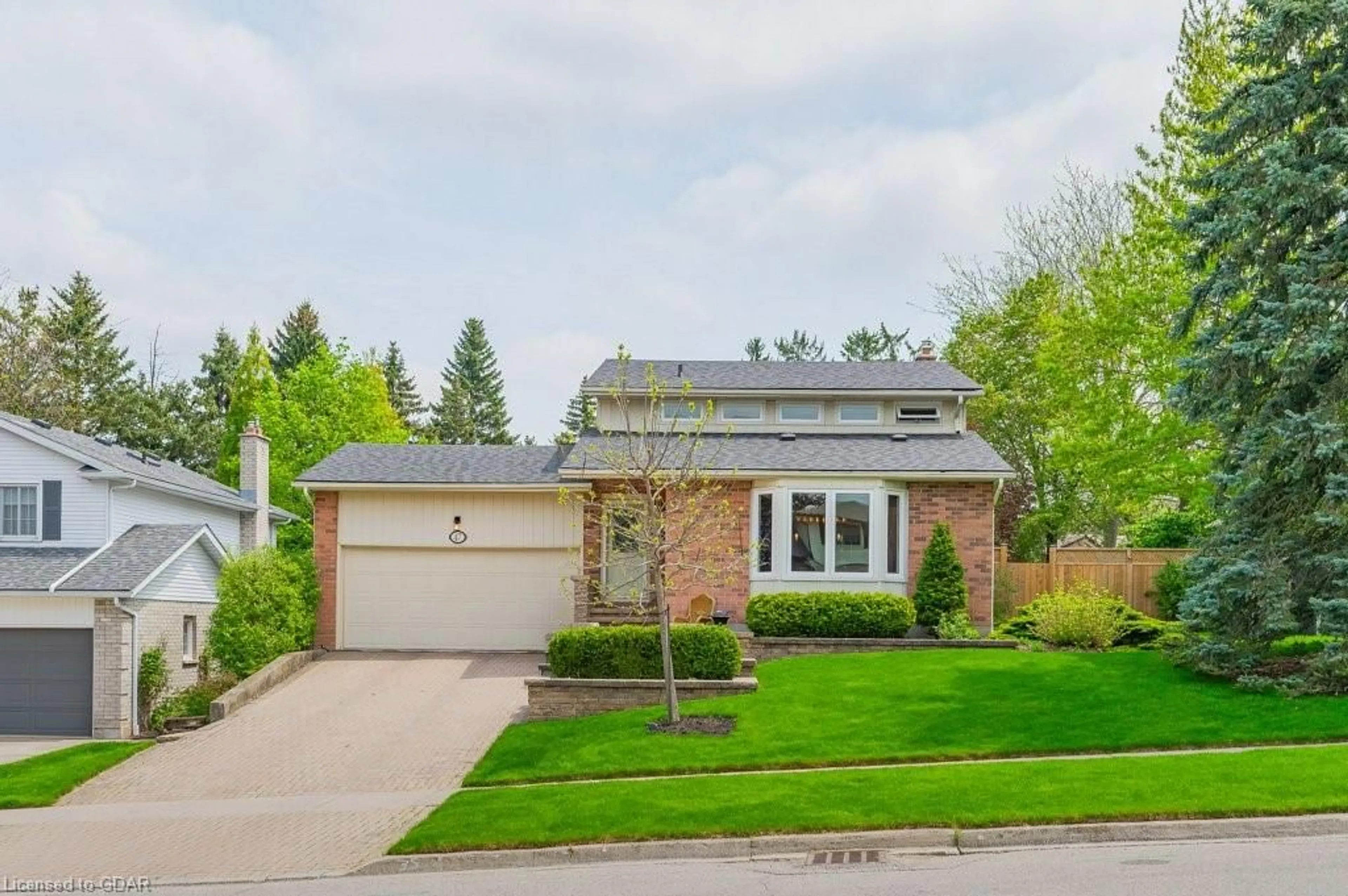Frontside or backside of a home for 47 Wimbledon Rd, Guelph Ontario N1H 7R6