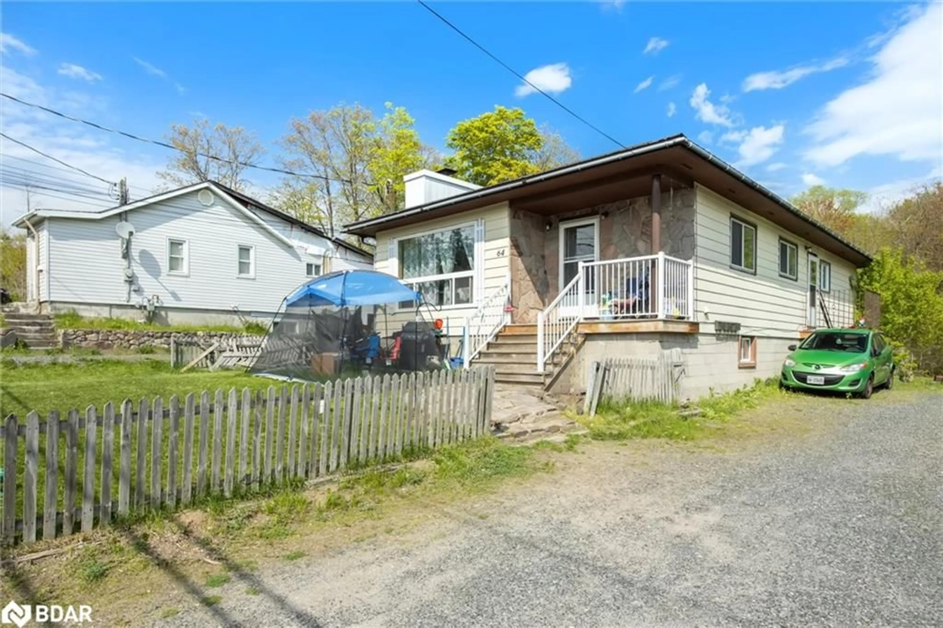 Frontside or backside of a home for 64 Emily St, Parry Sound Ontario P2A 2P5