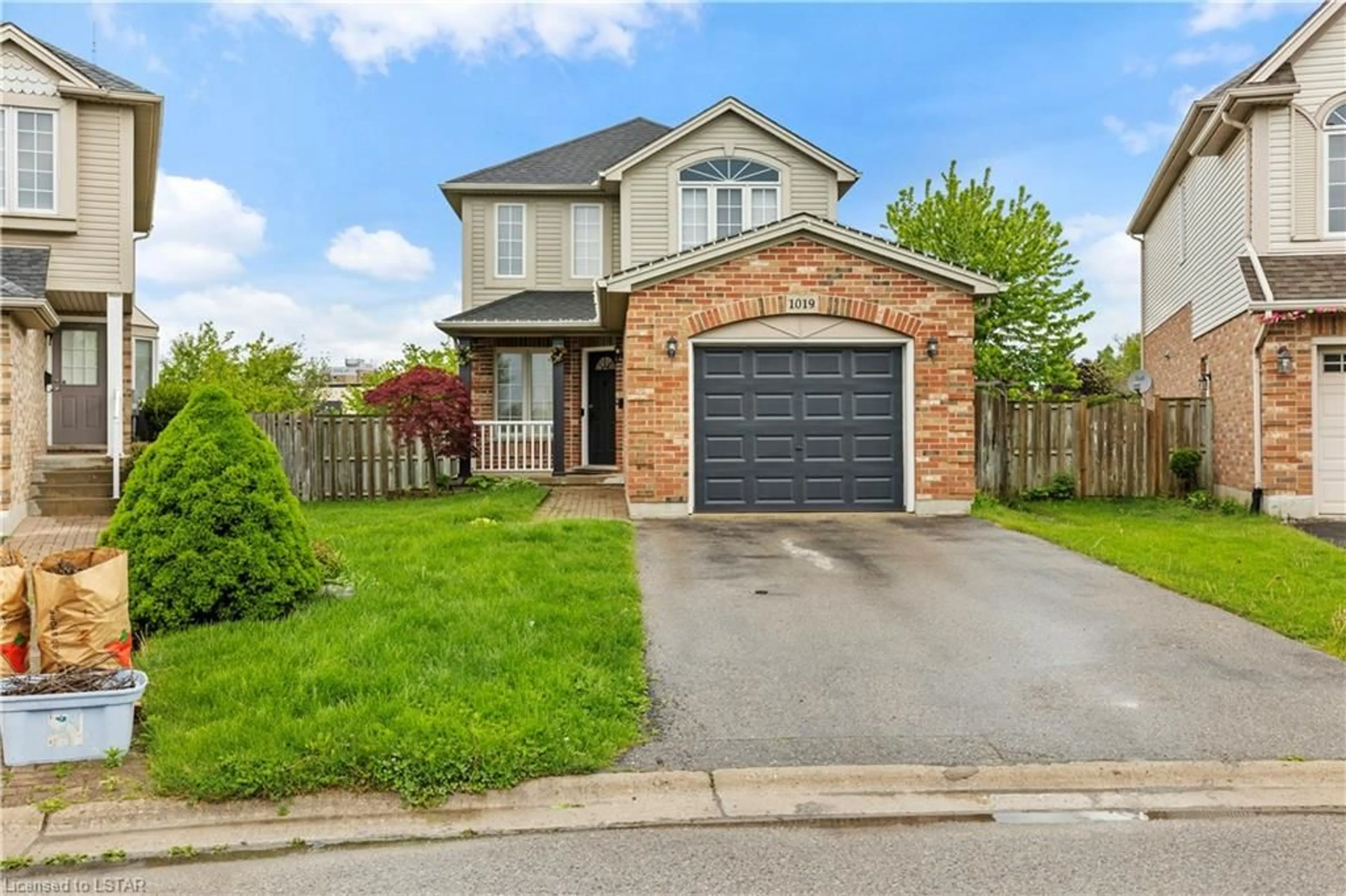 Frontside or backside of a home for 1019 Homeview Crt, London Ontario N6C 6C1
