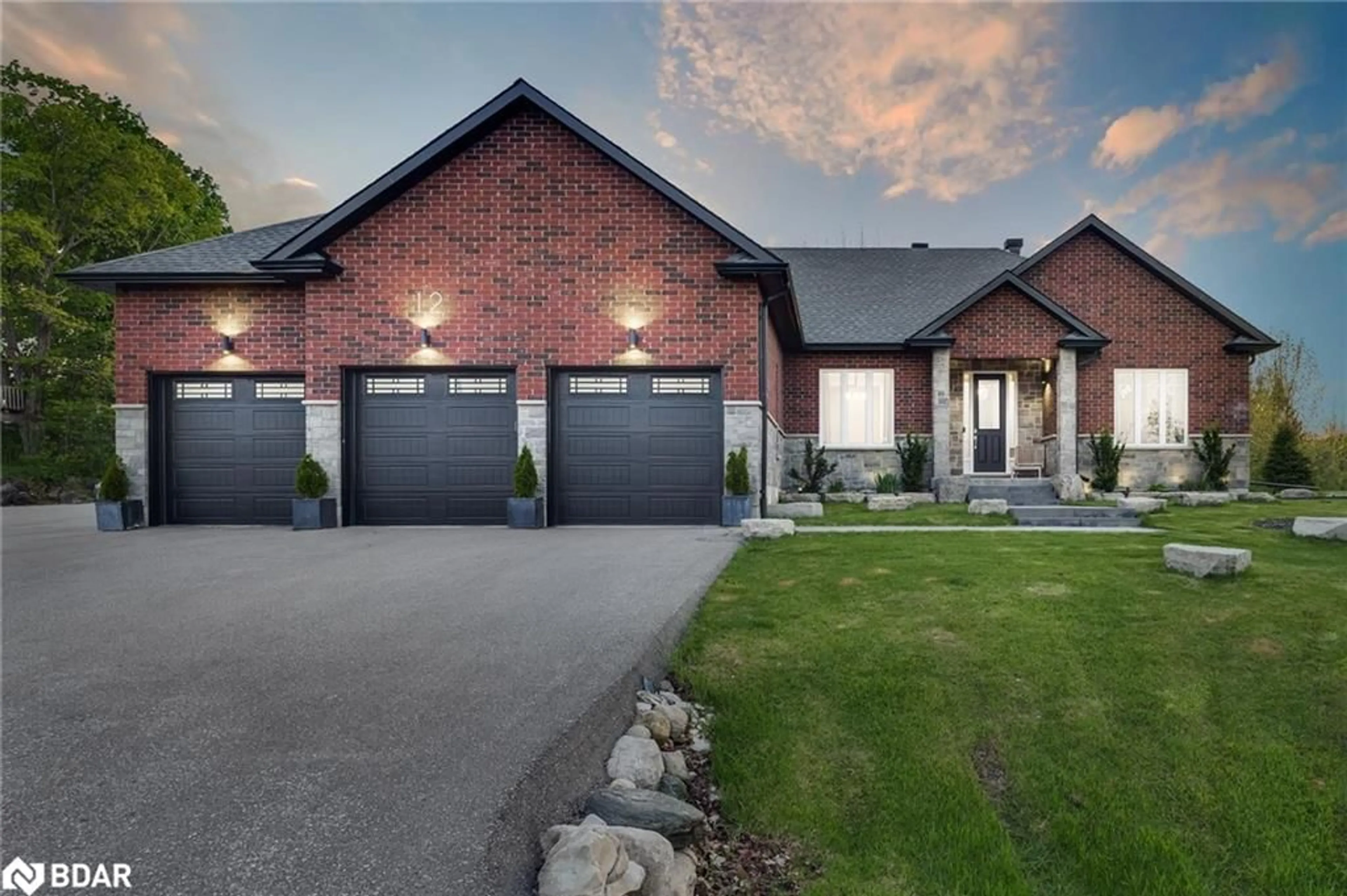Home with brick exterior material for 12 Reids Ridge, Moonstone Ontario L0K 1N0