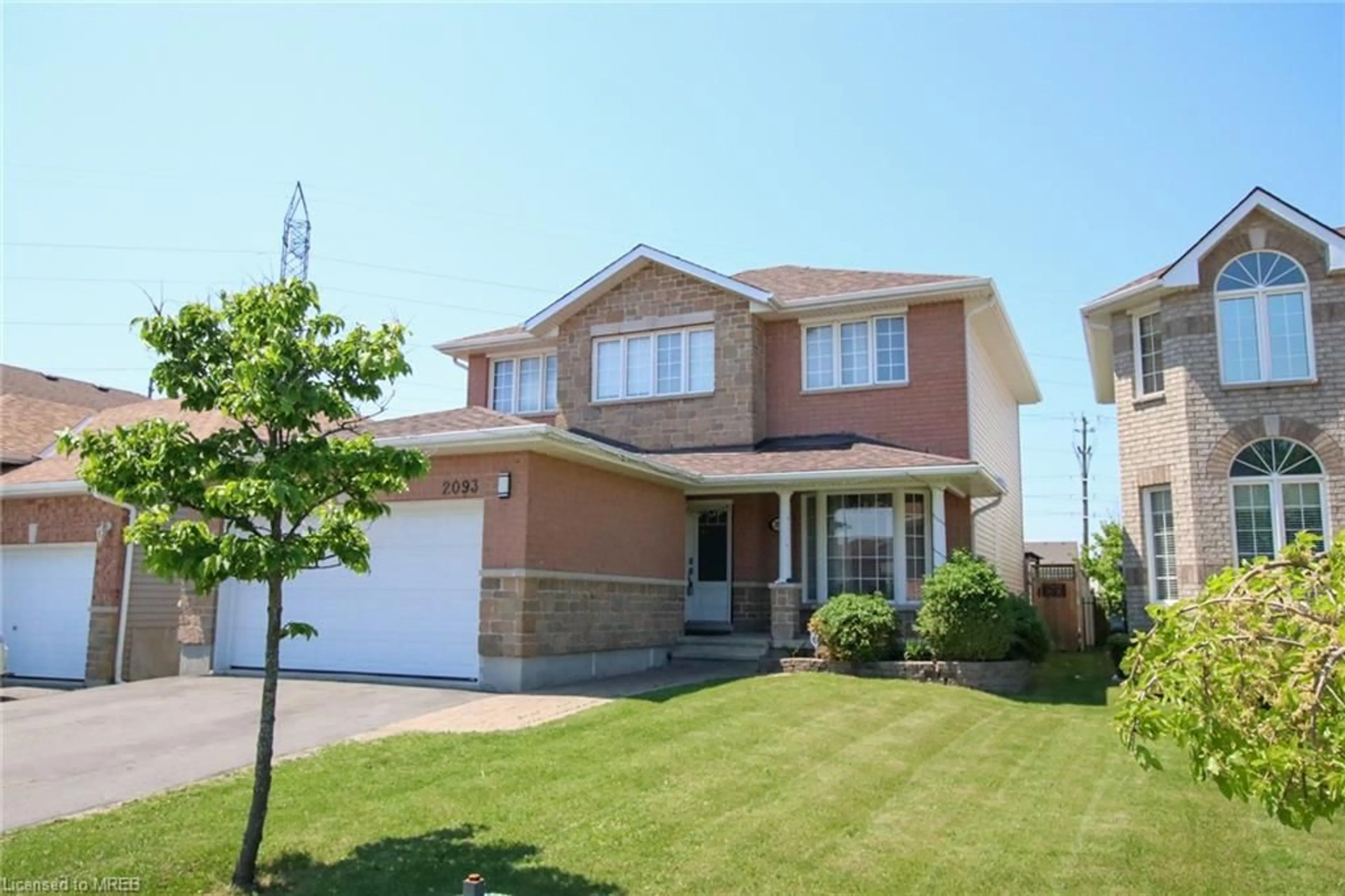 Frontside or backside of a home for 2093 Swanfield St, Kingston Ontario K7M 0A9