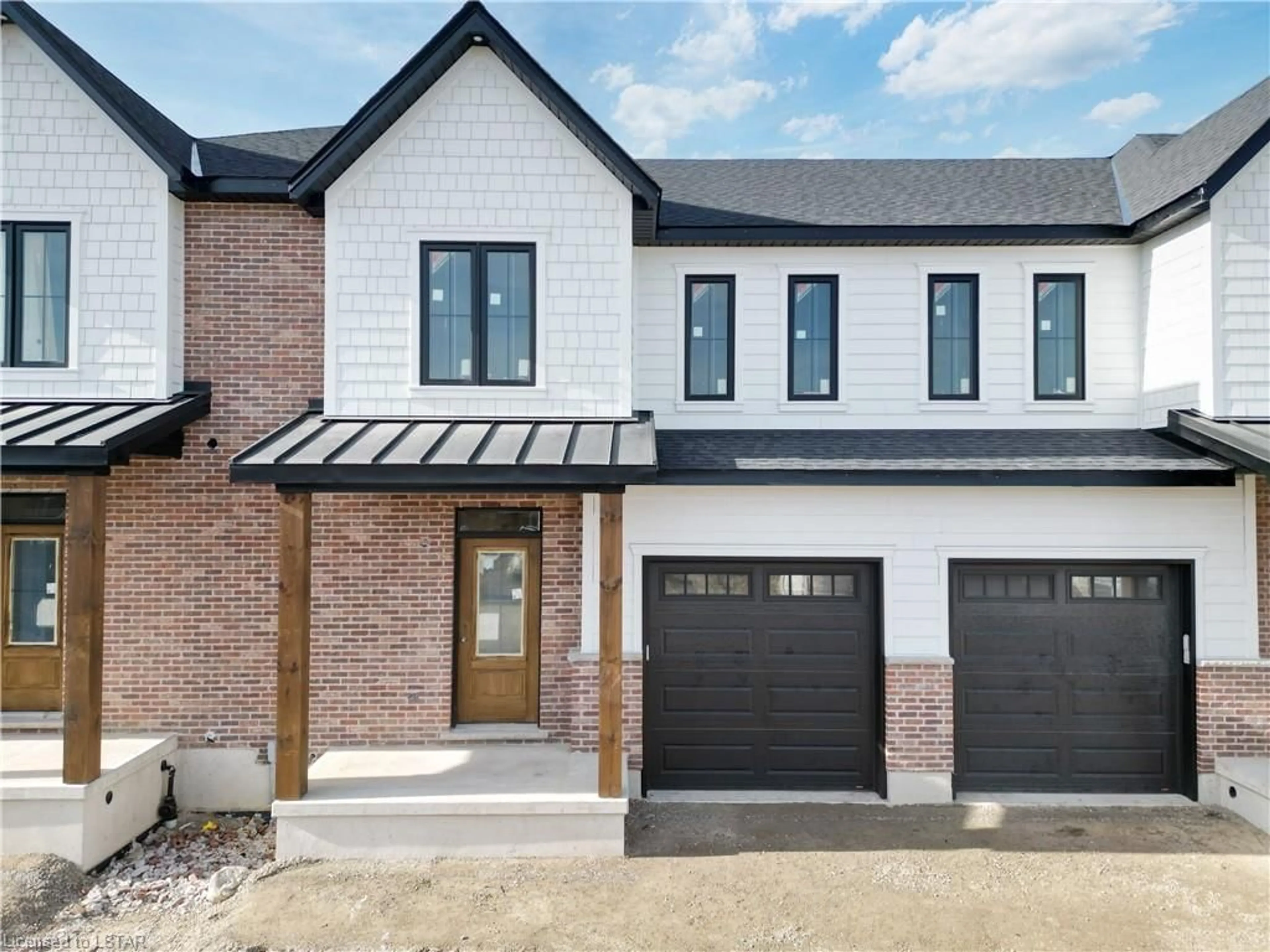 Home with brick exterior material for 147 Scotts Dr #51, Lucan Ontario N0M 2J0