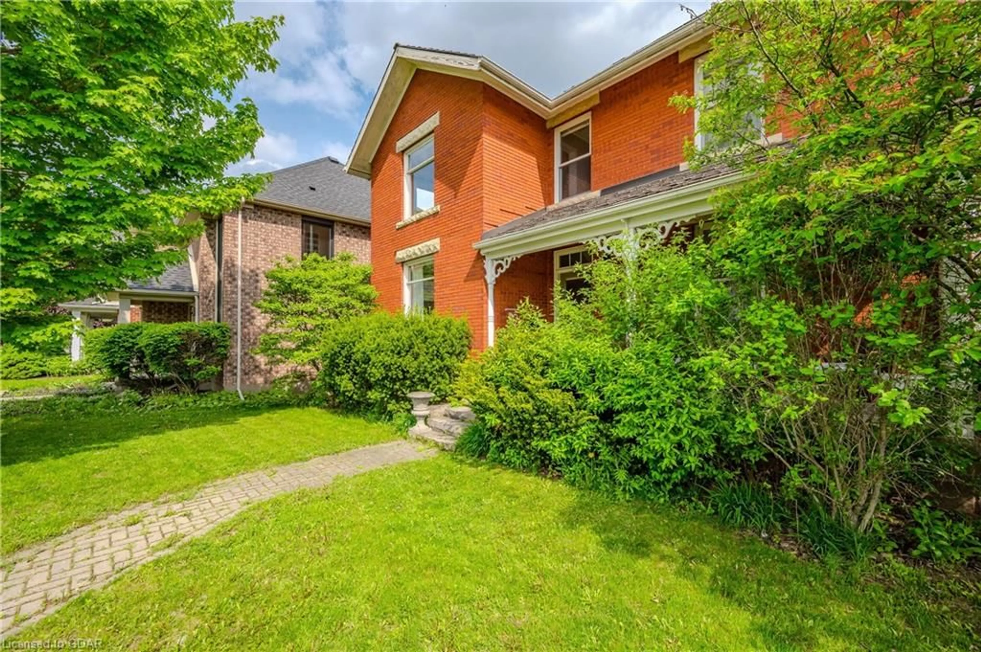 Frontside or backside of a home for 61 Clairfields Dr, Guelph Ontario N1L 1L9