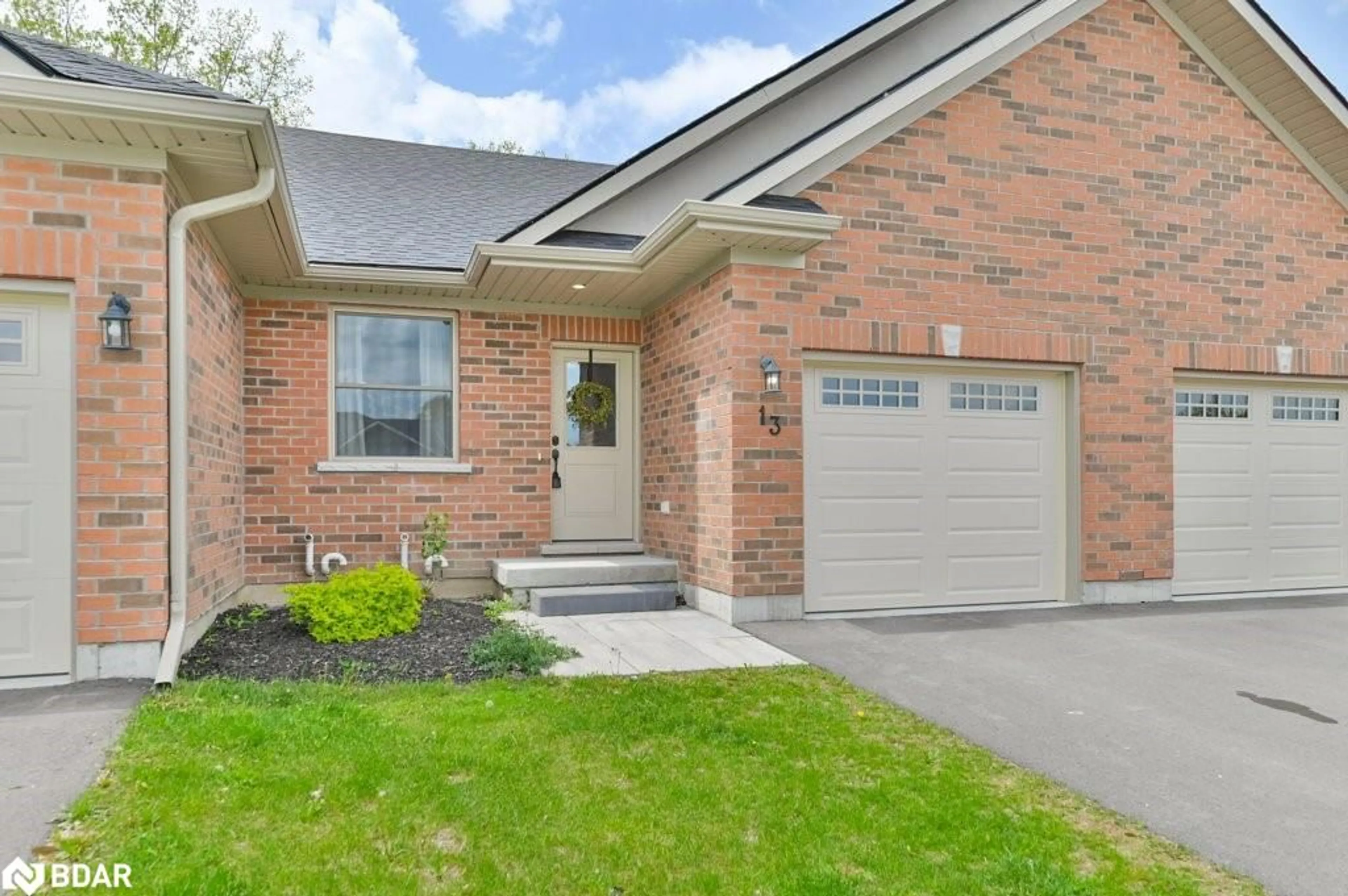 Home with brick exterior material for 13 Carrick St, Stirling Ontario K0K 3E0