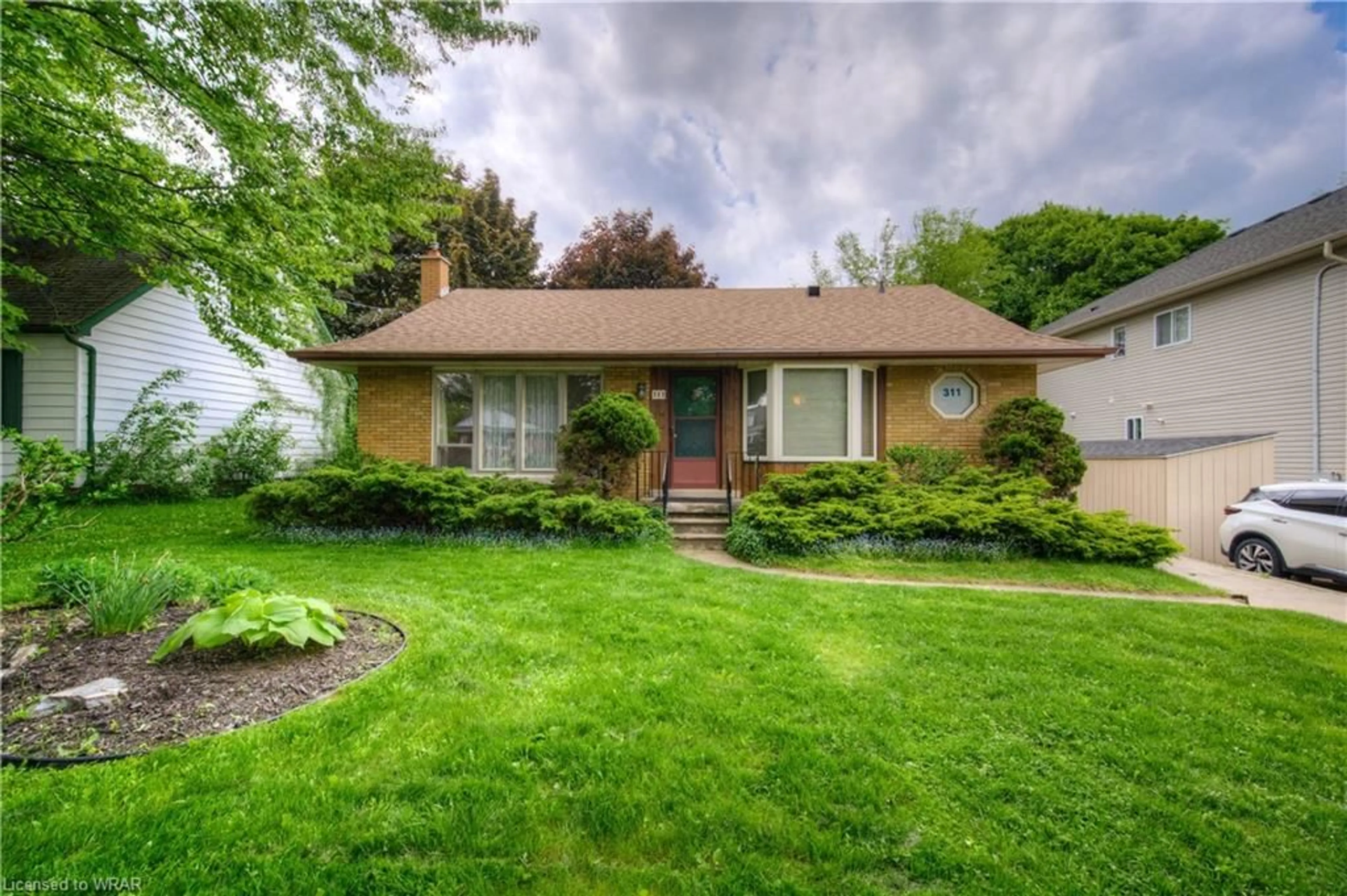 Frontside or backside of a home for 311 Edwin St, Kitchener Ontario N2H 4P5
