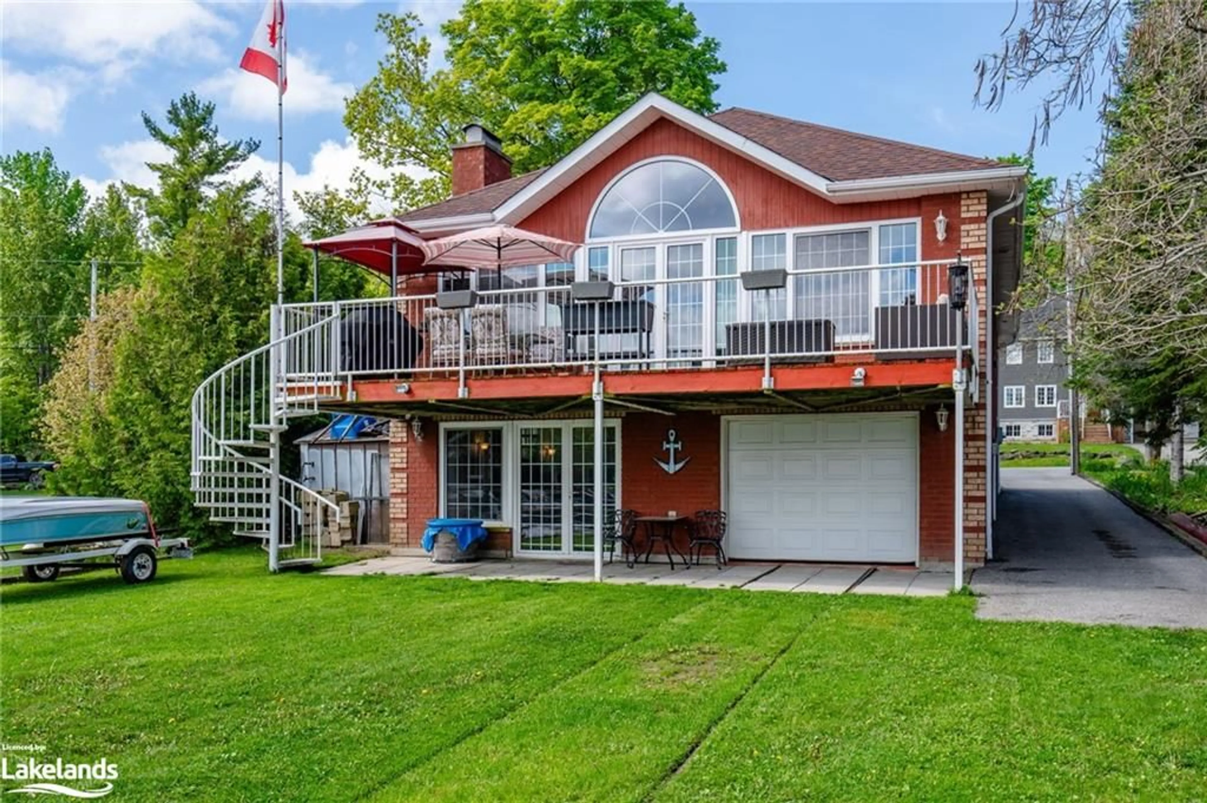 Frontside or backside of a home for 216 Robins Point Rd, Victoria Harbour Ontario L0K 2A0