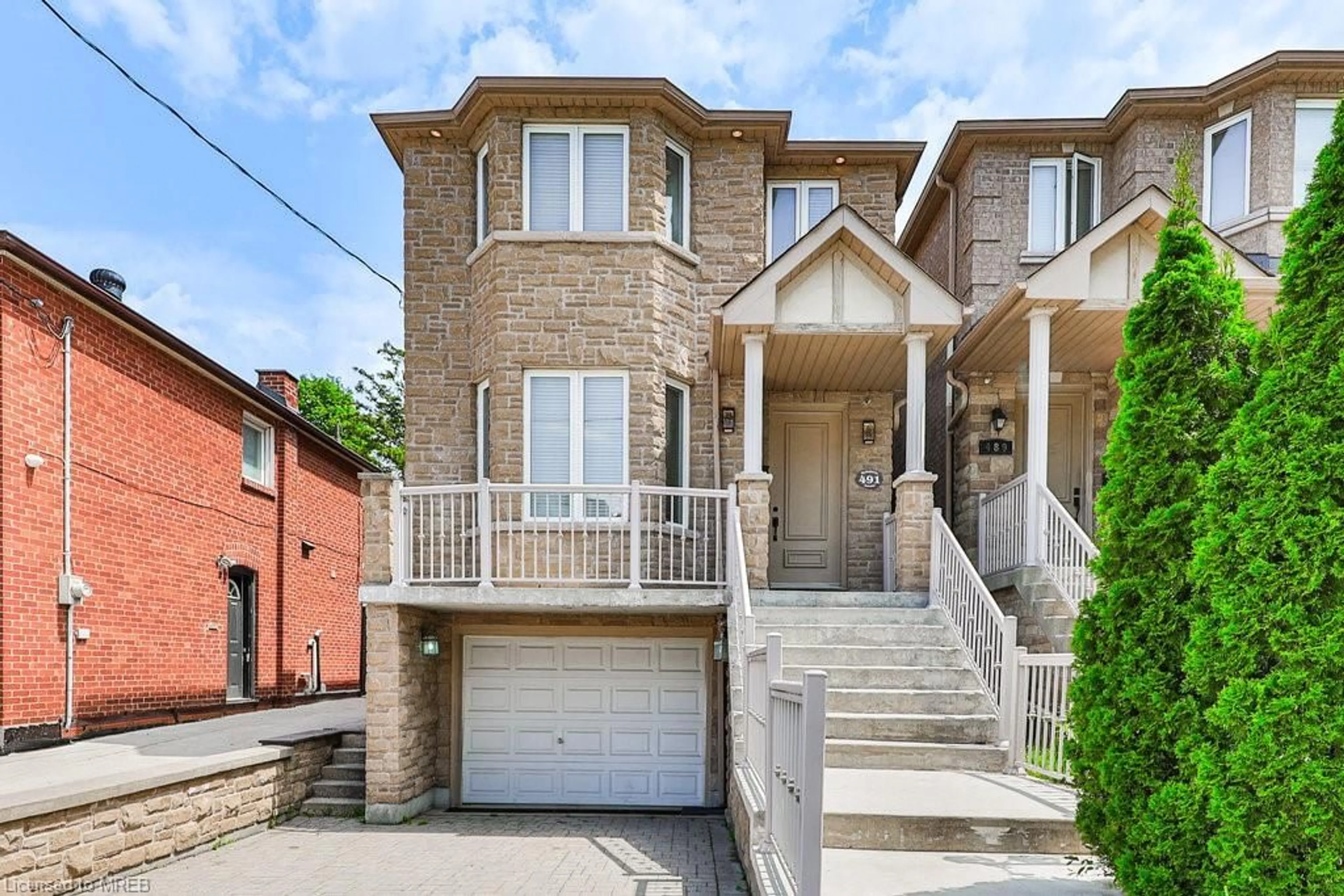 Frontside or backside of a home for 491 Mcroberts Ave, Toronto Ontario M6E 4R3
