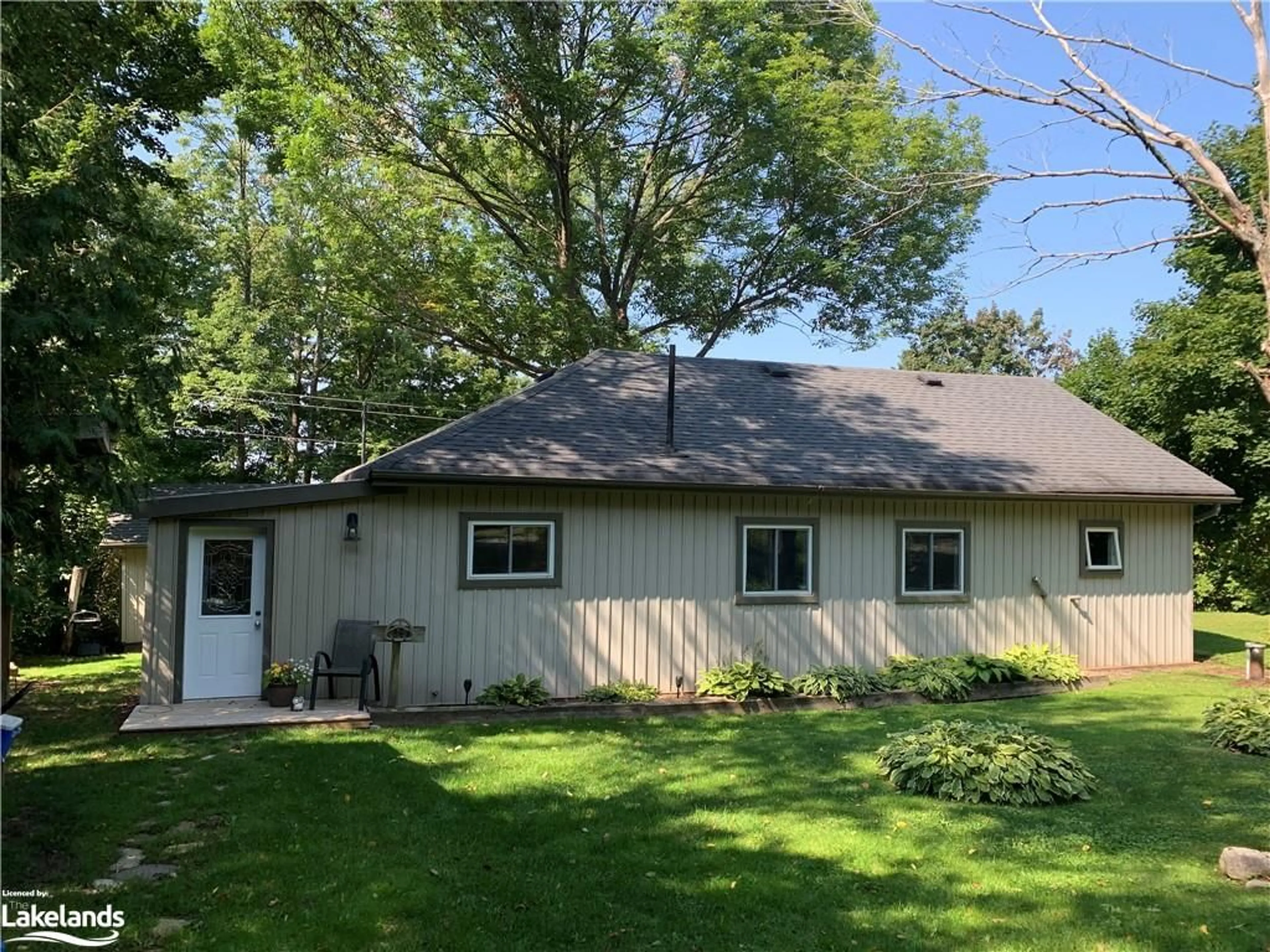 Frontside or backside of a home for 22 Robins Lane, Sebright Ontario L0K 1W0