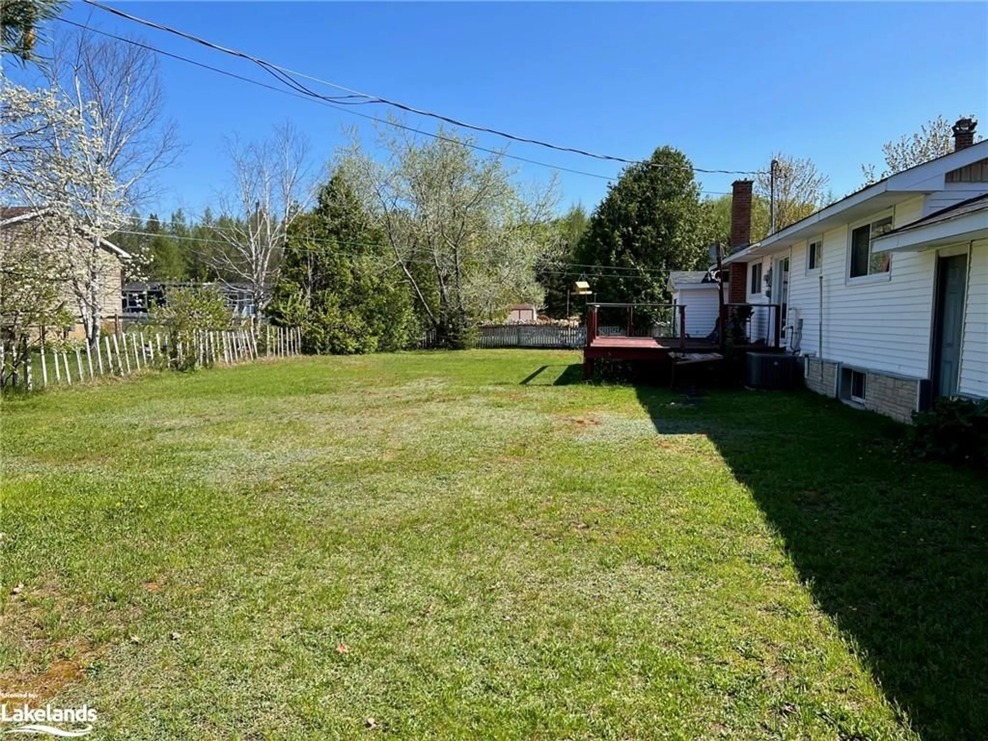 Fenced yard for 33 Champion St, South River Ontario P0A 1X0