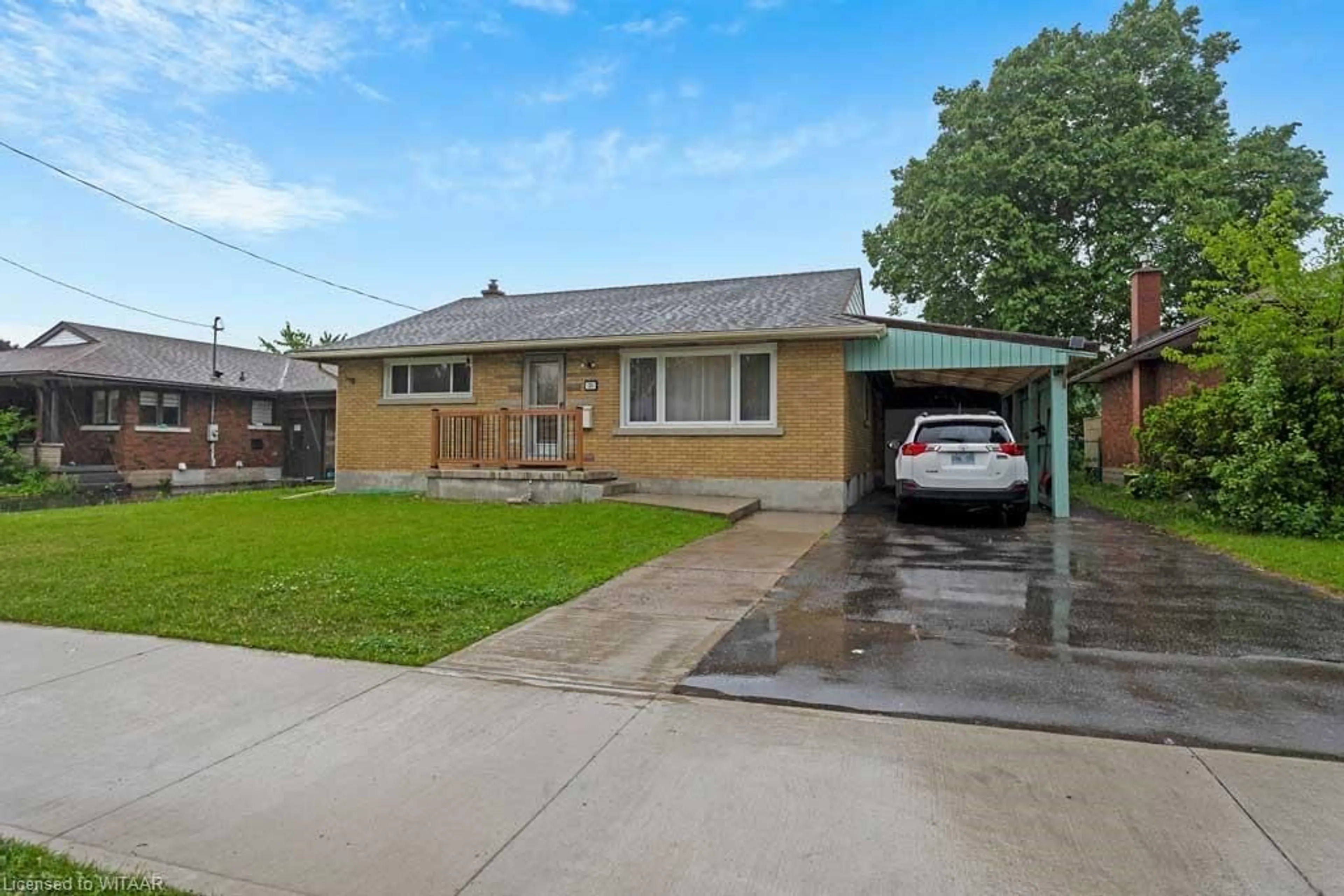 Frontside or backside of a home for 30 Traynor Ave, Kitchener Ontario N2C 1V9