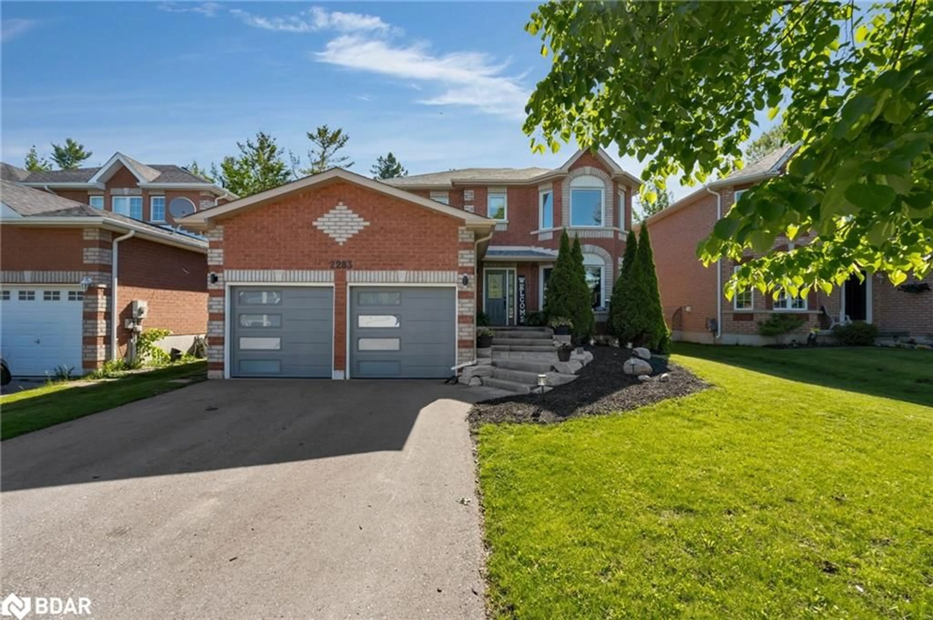 Frontside or backside of a home for 2283 Jack Cres, Innisfil Ontario L9S 2C7