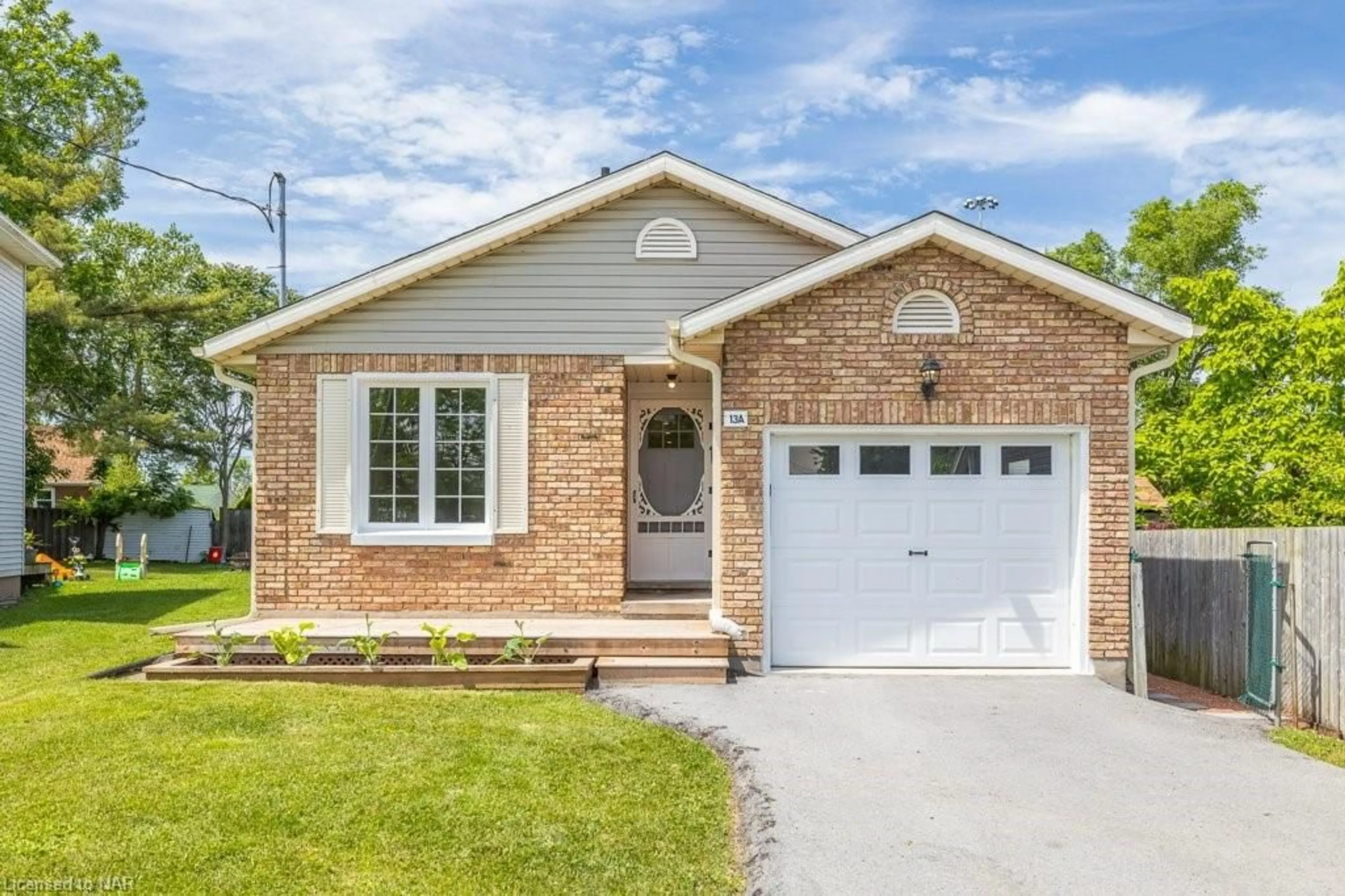 Home with brick exterior material for 13A Elmwood Ave, St. Catharines Ontario L2R 2T5