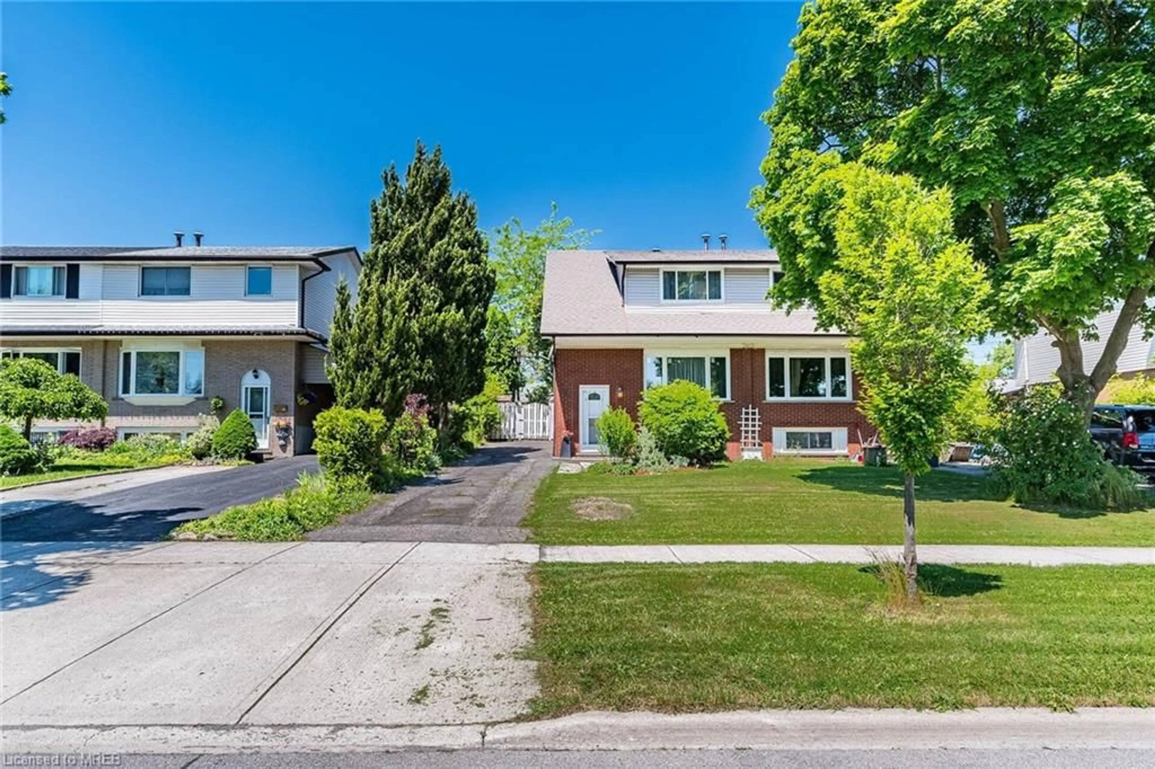 Frontside or backside of a home for 294 Quigley Rd, Hamilton Ontario L8K 5N1