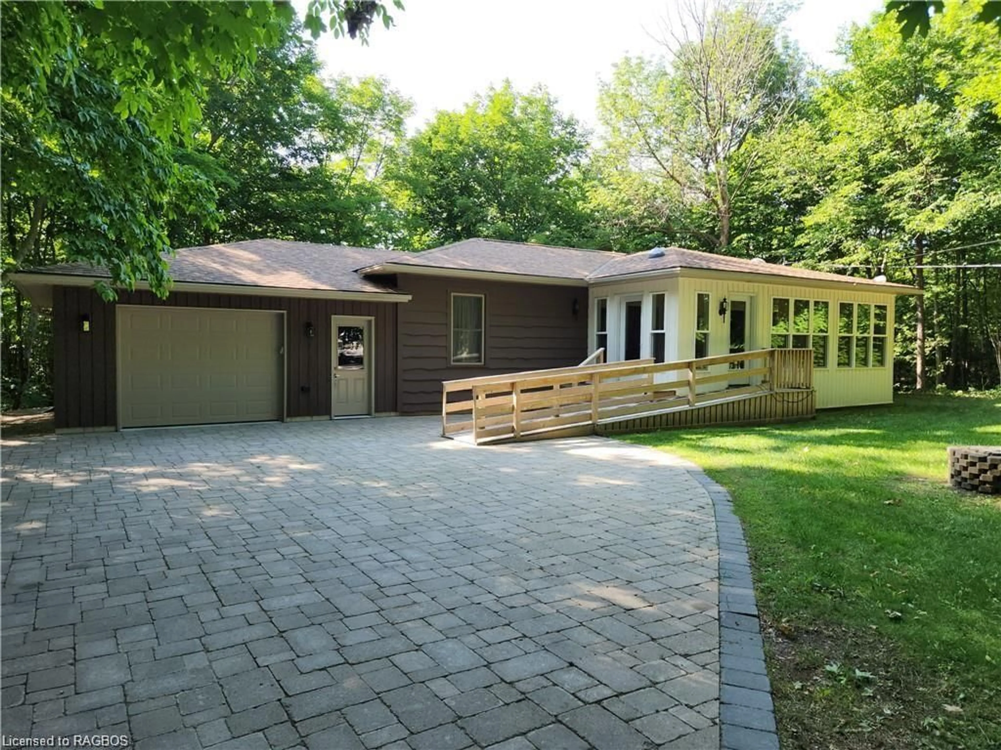 Frontside or backside of a home, cottage for 86 Moore St, Lion's Head Ontario N0H 1W0