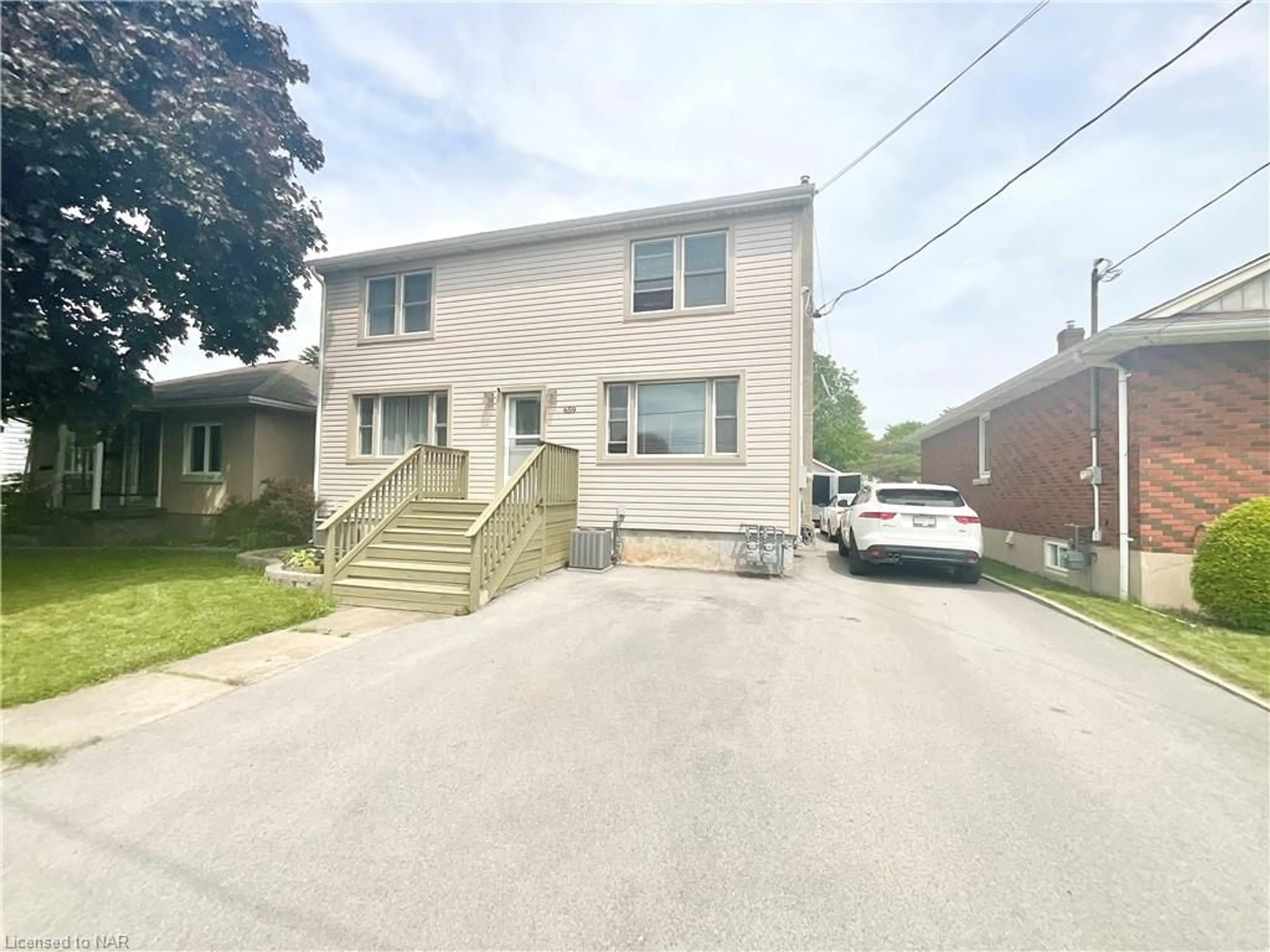 Frontside or backside of a home for 659 Elm St, Port Colborne Ontario L3K 4P9