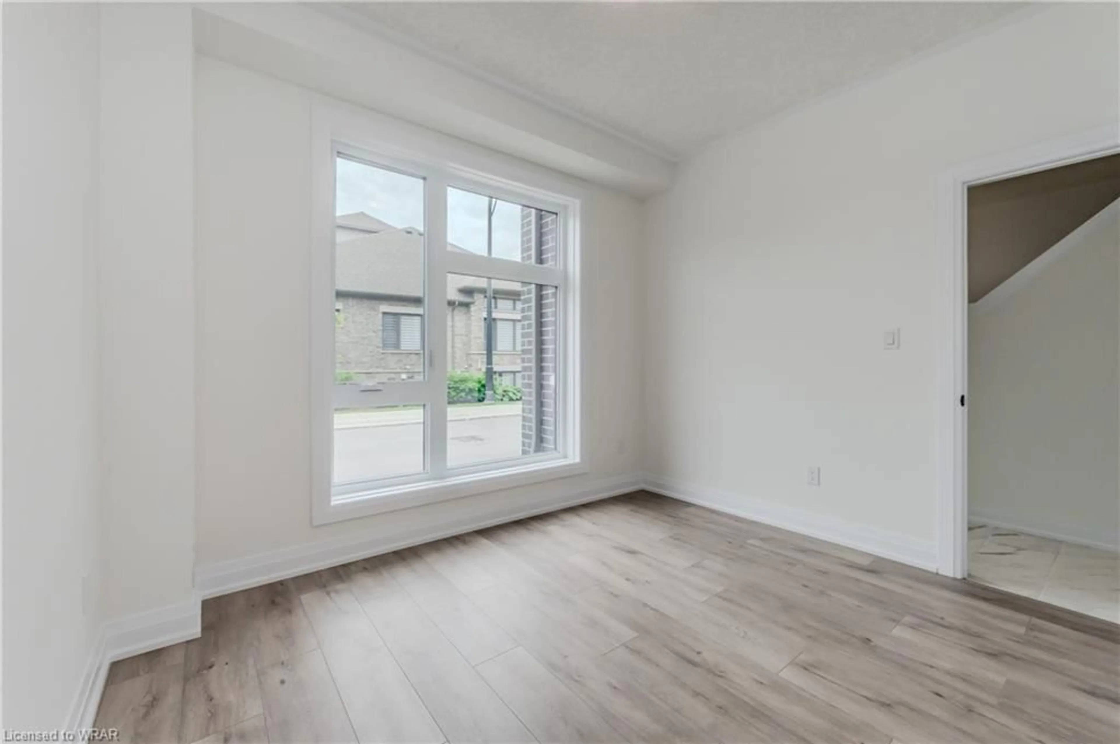 A pic of a room, wood floors for 271 Grey Silo Rd #44, Waterloo Ontario N2K 0E9