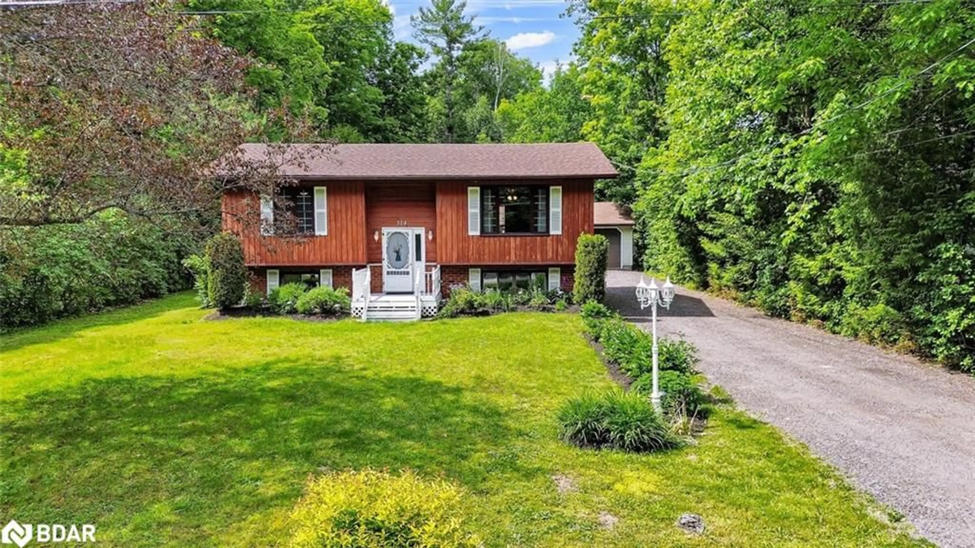 Home with brick exterior material for 314 Riverside Dr, Bobcaygeon Ontario K0M 1A0