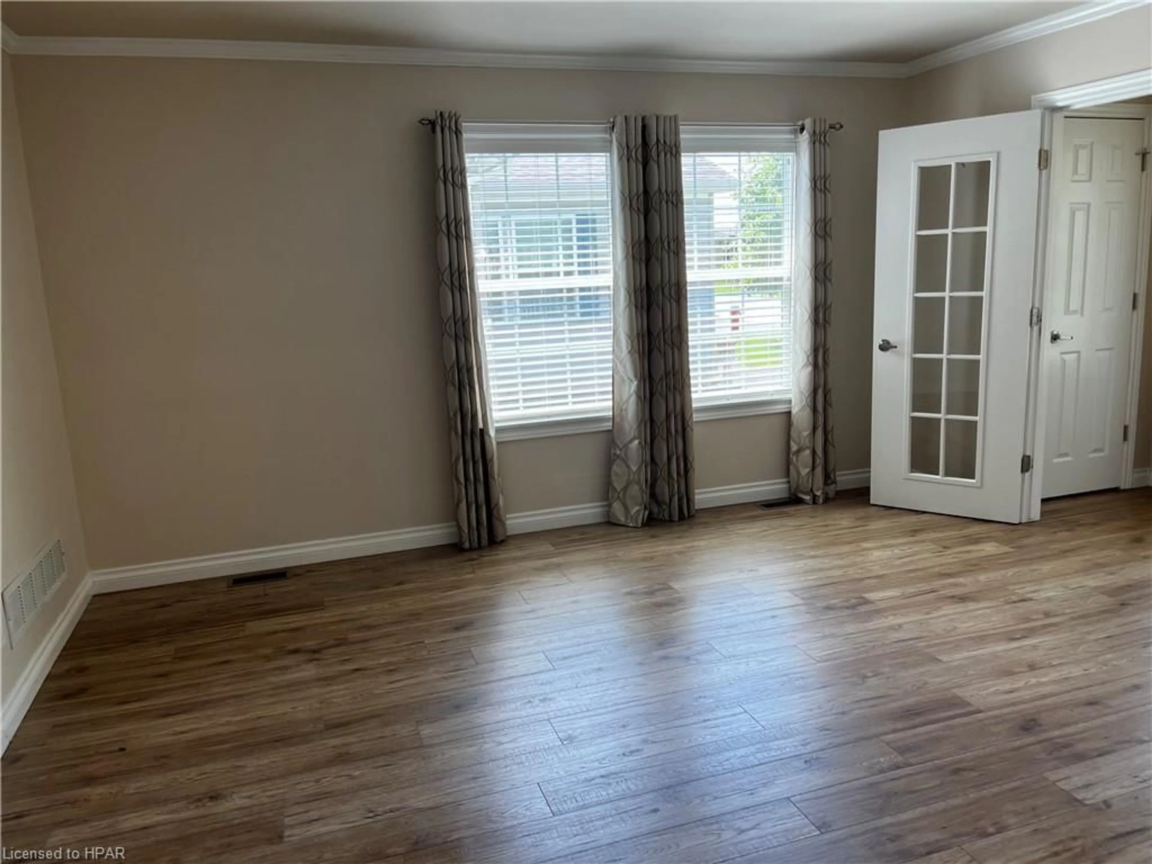 A pic of a room, wood floors for 20 Lindsay Cres, Strathroy Ontario N7G 3P4