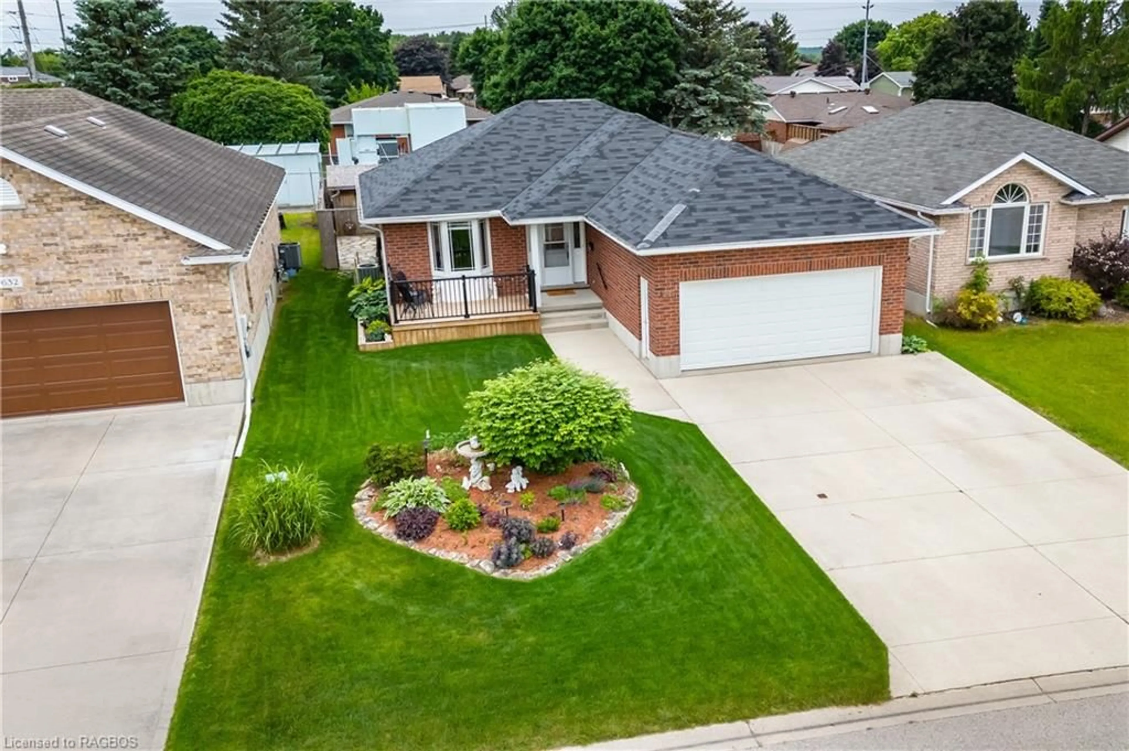 Frontside or backside of a home, the fenced backyard for 636 22nd Ave, Hanover Ontario N4N 3W7