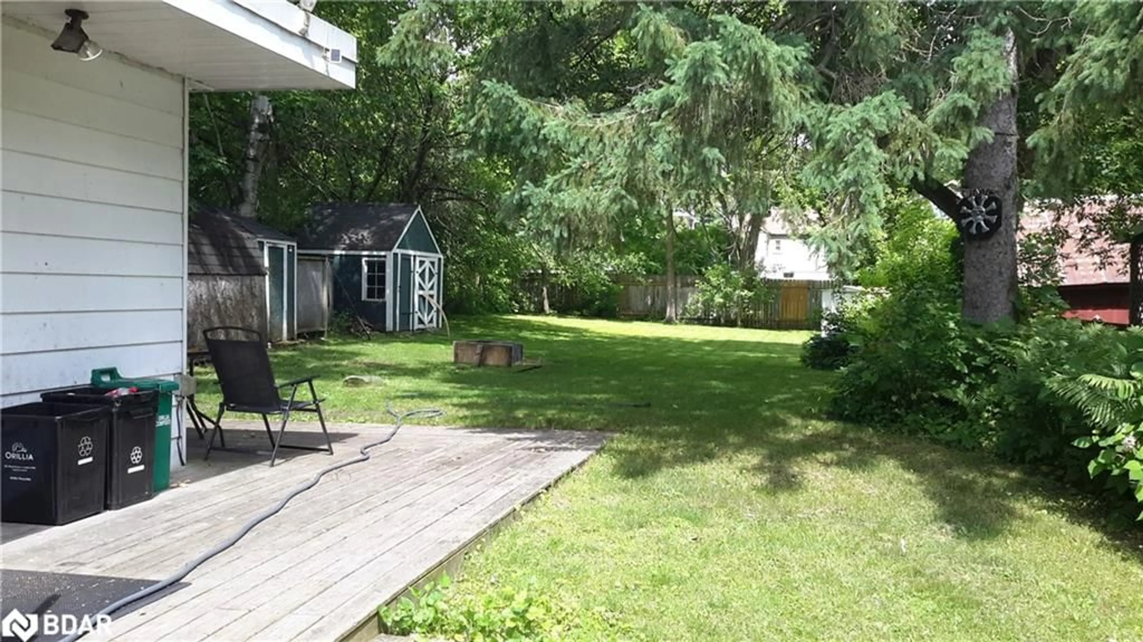 Patio, the fenced backyard for 232 Mary St, Orillia Ontario L3V 3E6