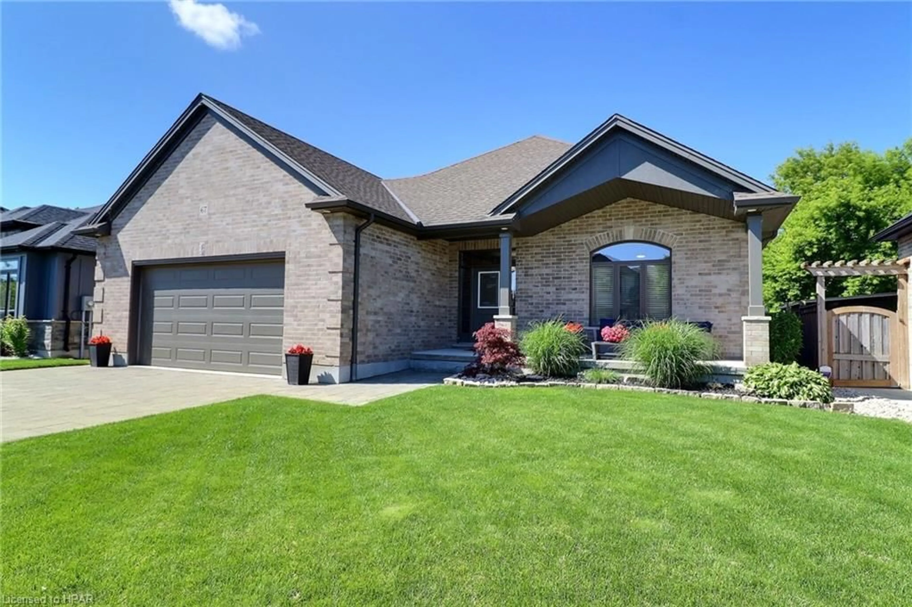 Frontside or backside of a home for 67 Caverhill Cres, Komoka Ontario N0L 1R0