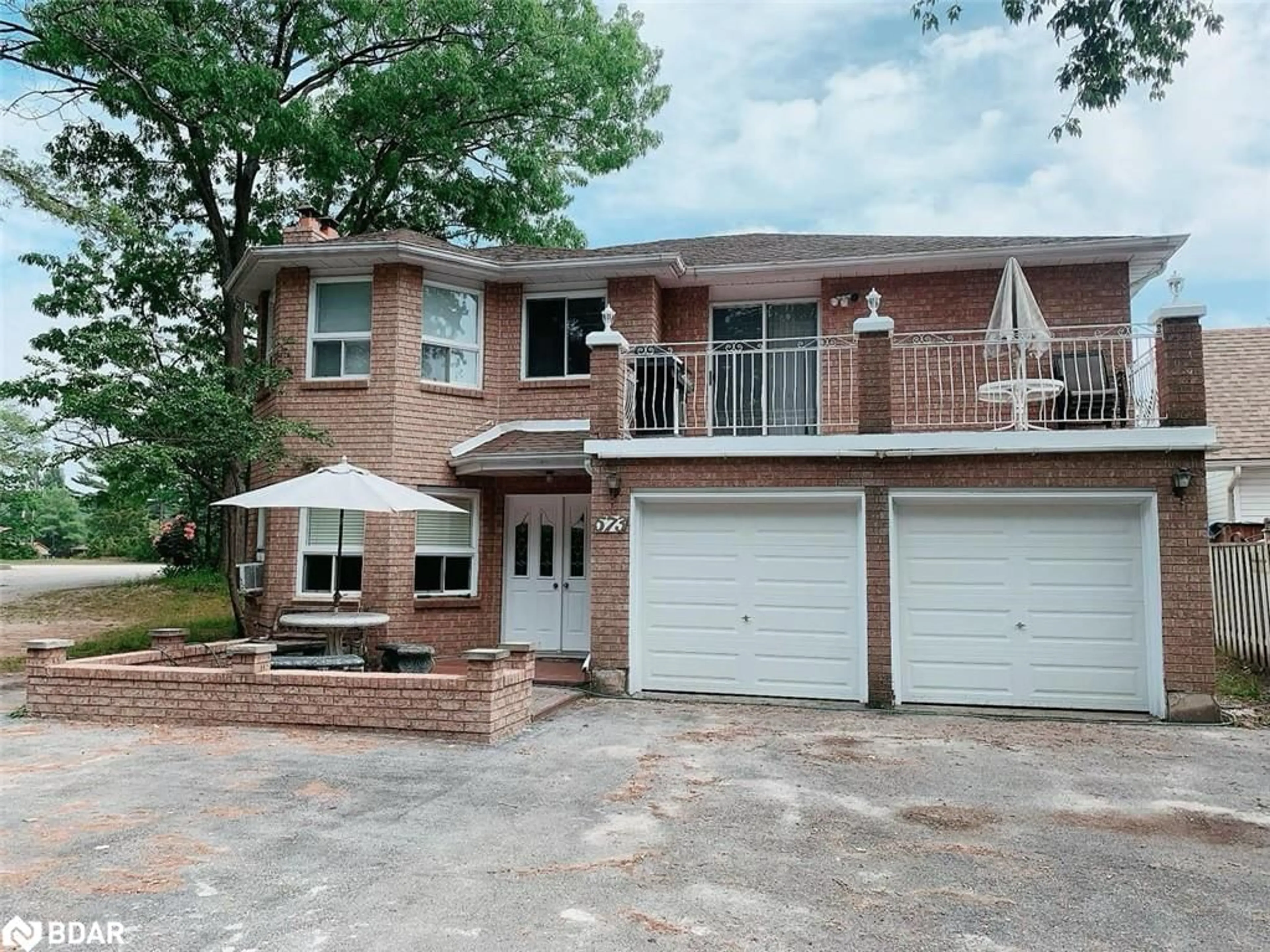 Home with brick exterior material for 573 Mosley St, Wasaga Beach Ontario L9Z 2J4