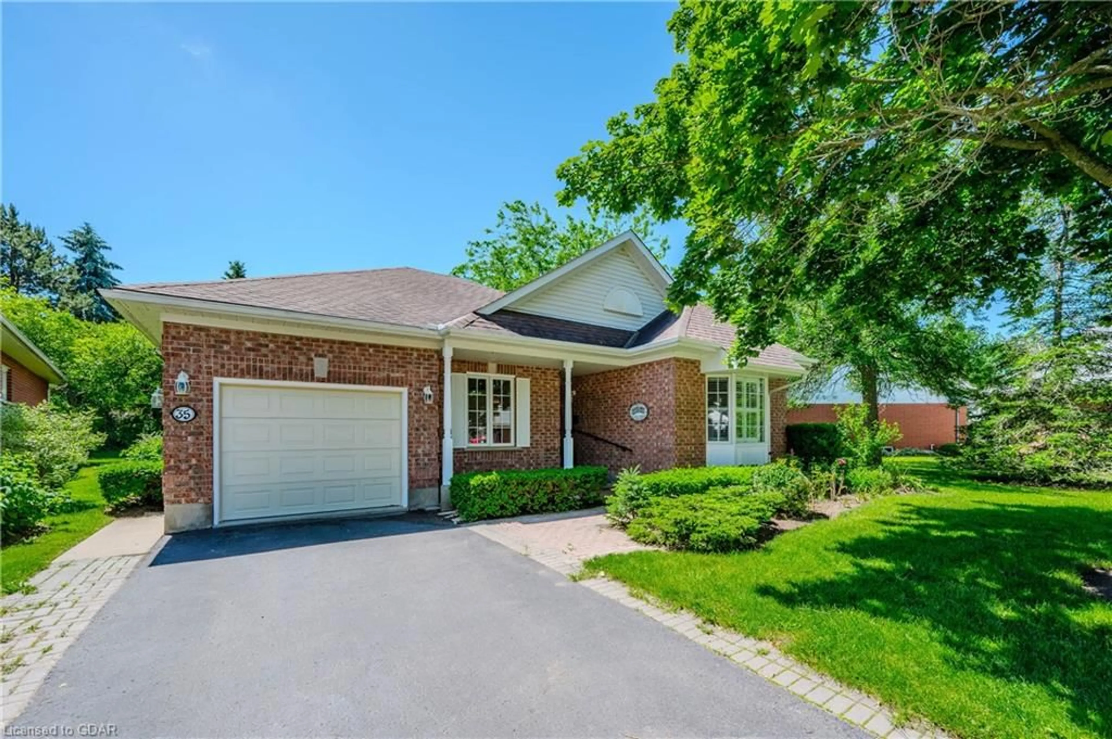 Home with brick exterior material for 35 White Pine Way, Guelph Ontario N1G 4X7