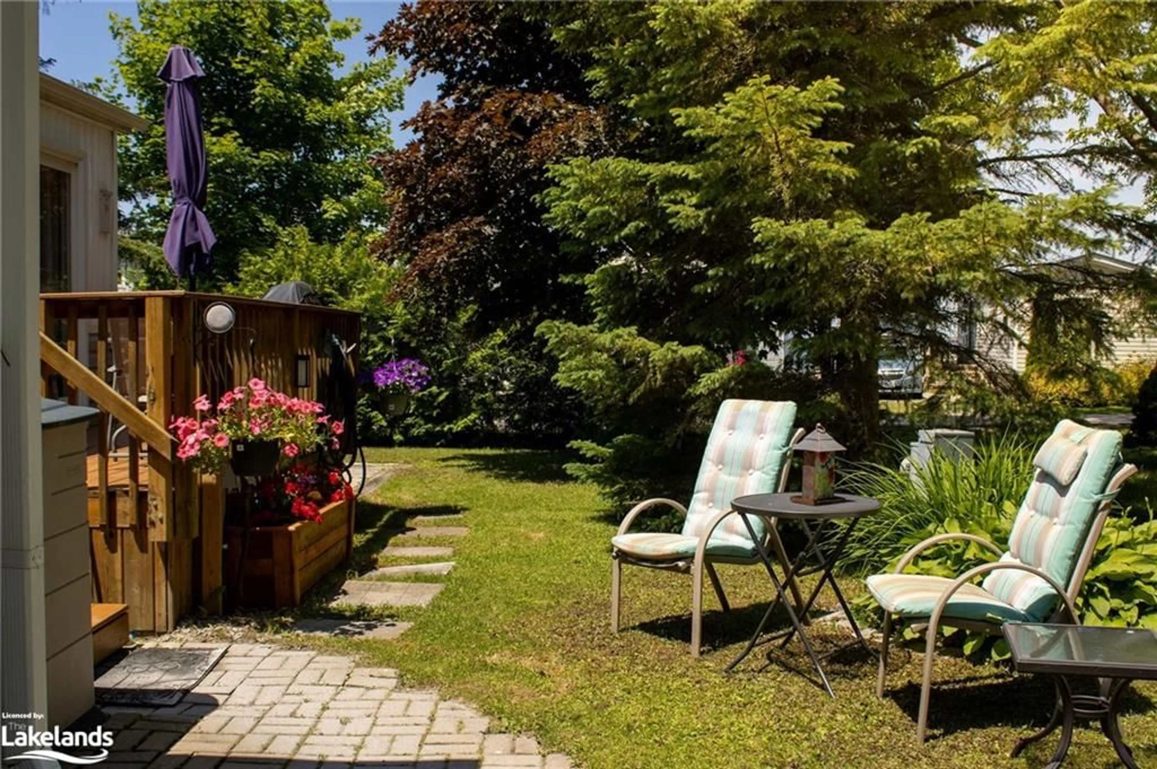 Patio, the fenced backyard for 10 Winfield Dr #104, Victoria Harbour Ontario L0K 2A0