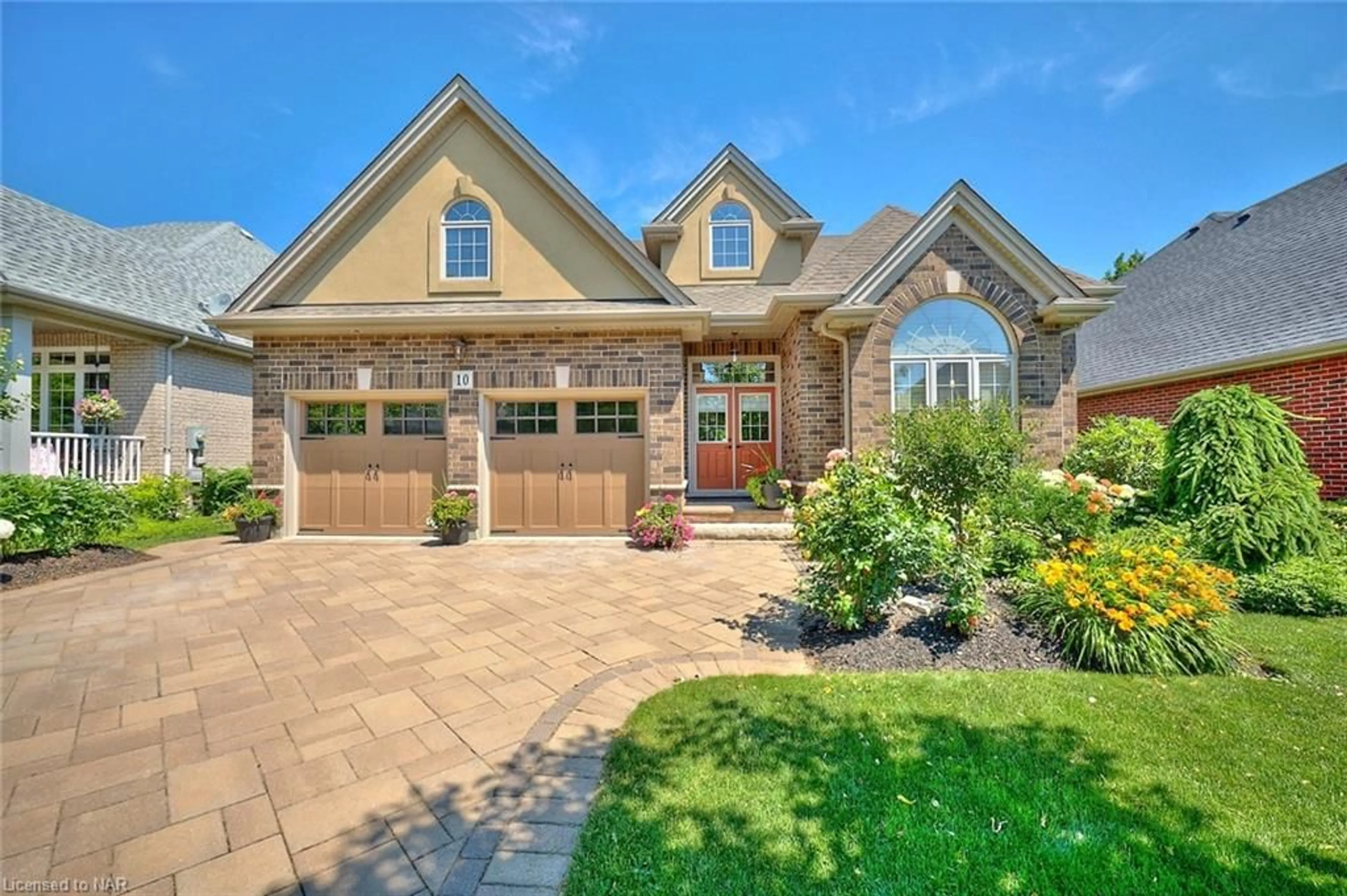 Home with brick exterior material for 10 Tulip Tree Rd, Niagara-on-the-Lake Ontario L0S 1J1