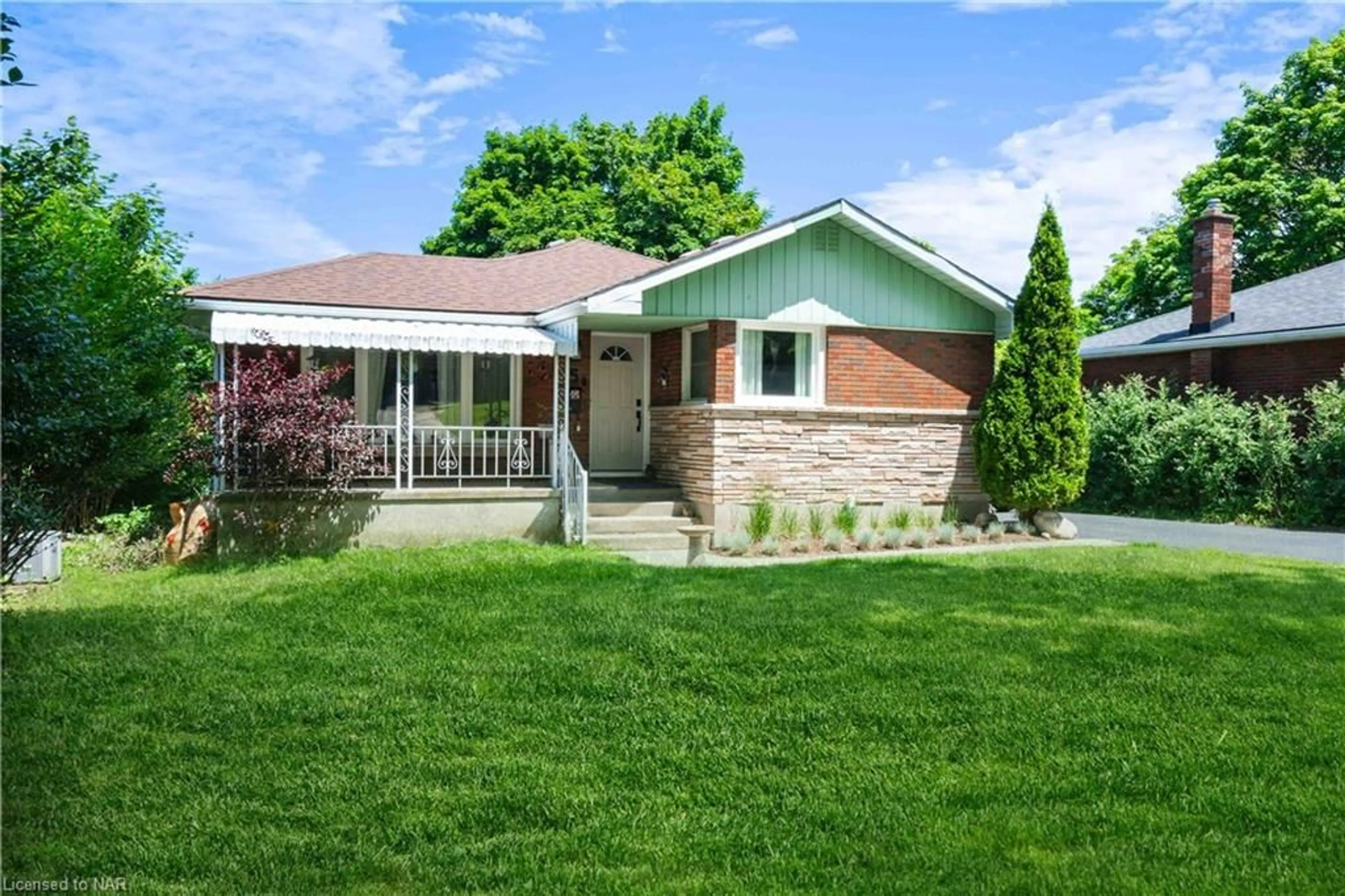 Frontside or backside of a home for 5 Rockdale Ave, St. Catharines Ontario L2T 1V3