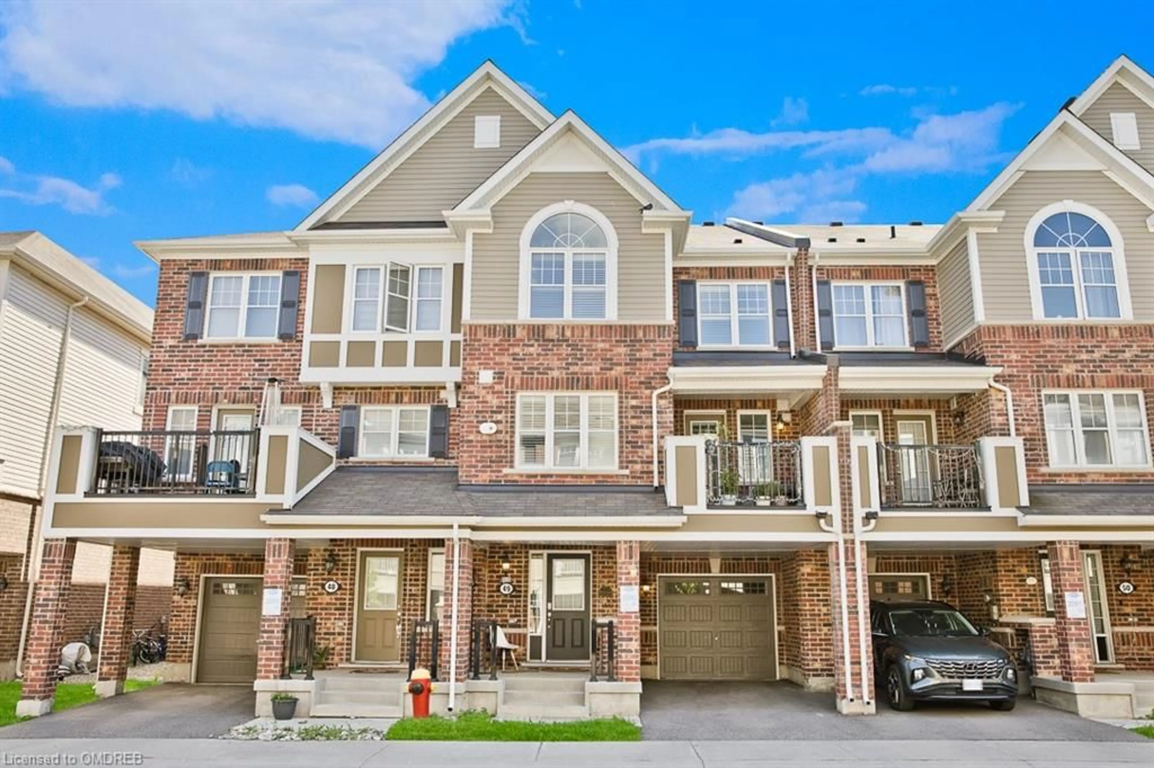 A pic from exterior of the house or condo for 1222 Rose Way #49, Milton Ontario L9E 1P3