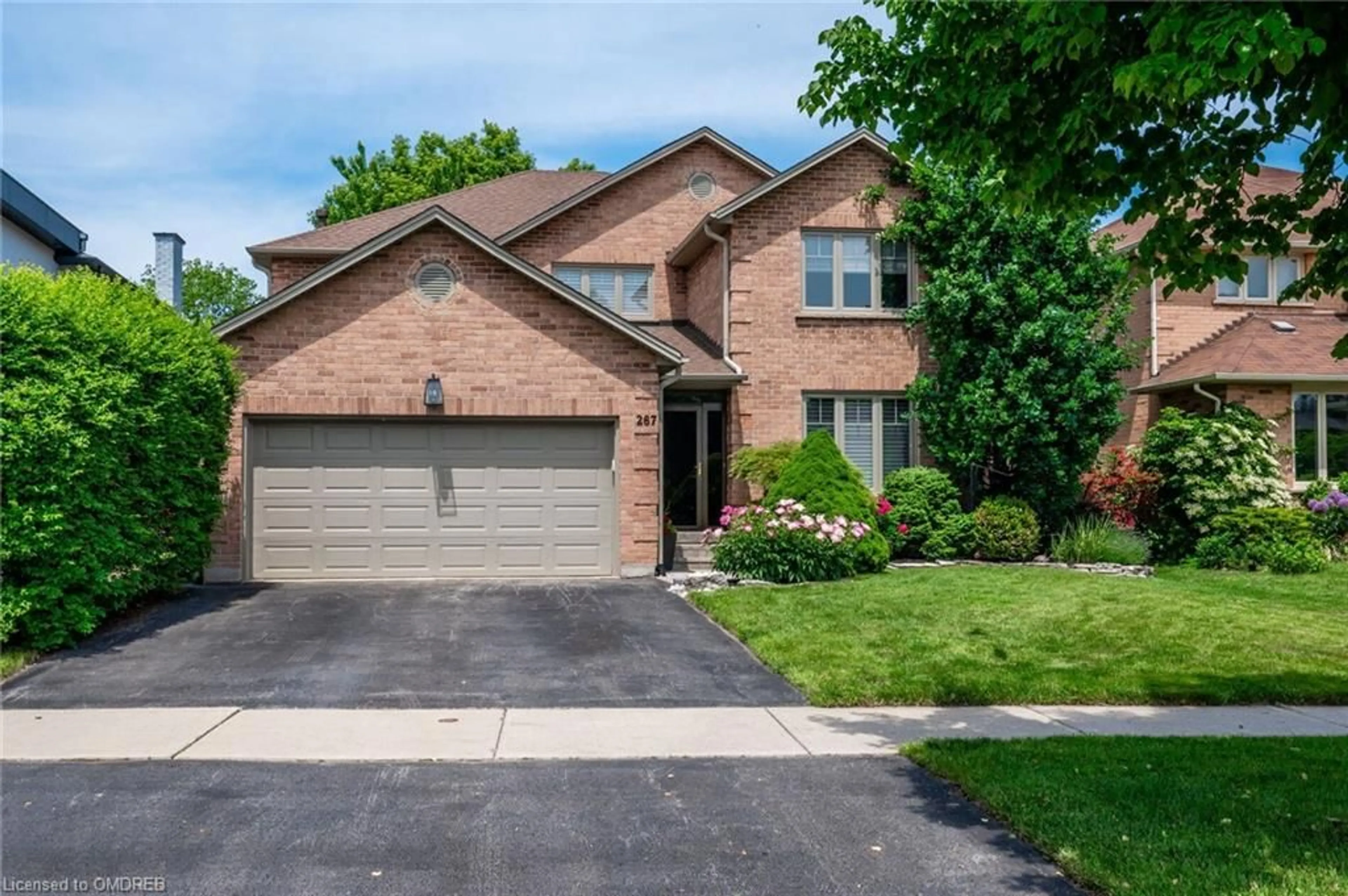 Home with brick exterior material for 267 River Oaks Blvd, Oakville Ontario L6H 3V2