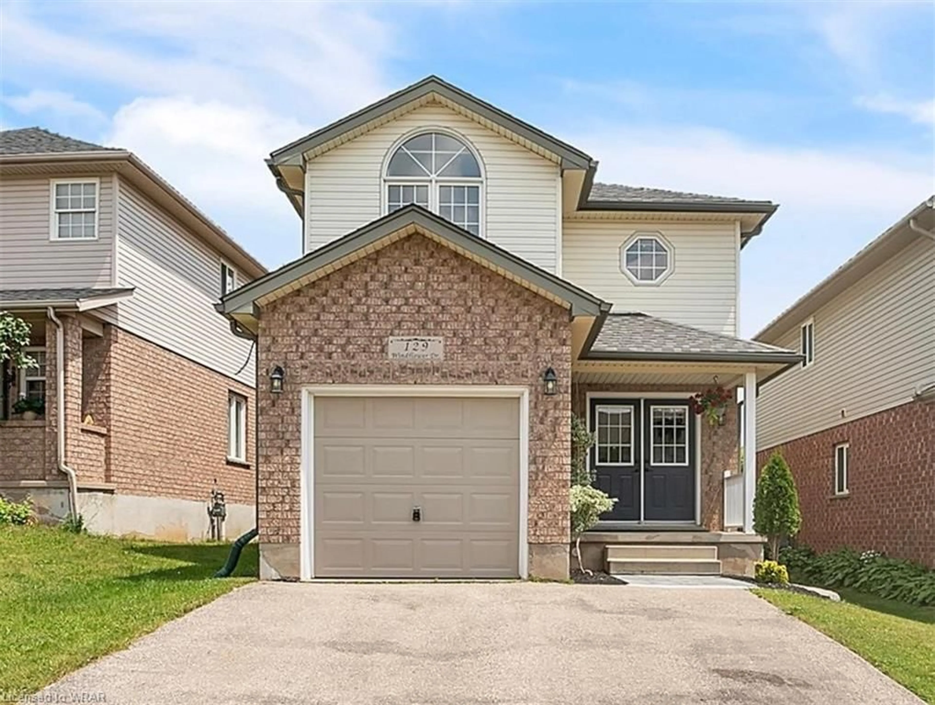 Frontside or backside of a home for 129 Windflower Dr, Kitchener Ontario N2E 3S9