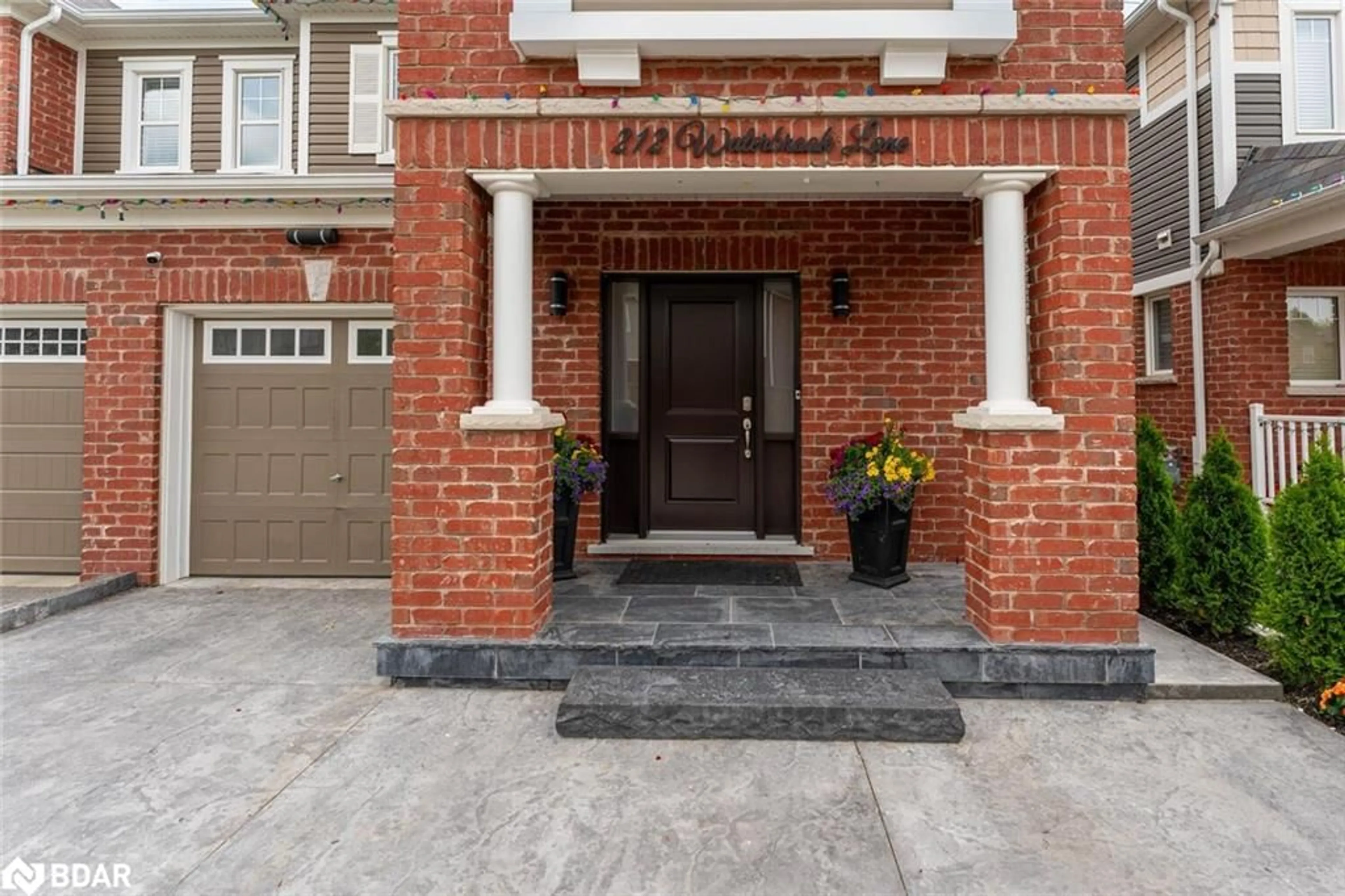 Home with brick exterior material for 212 Waterbrook Lane, Kitchener Ontario N2P 2X6