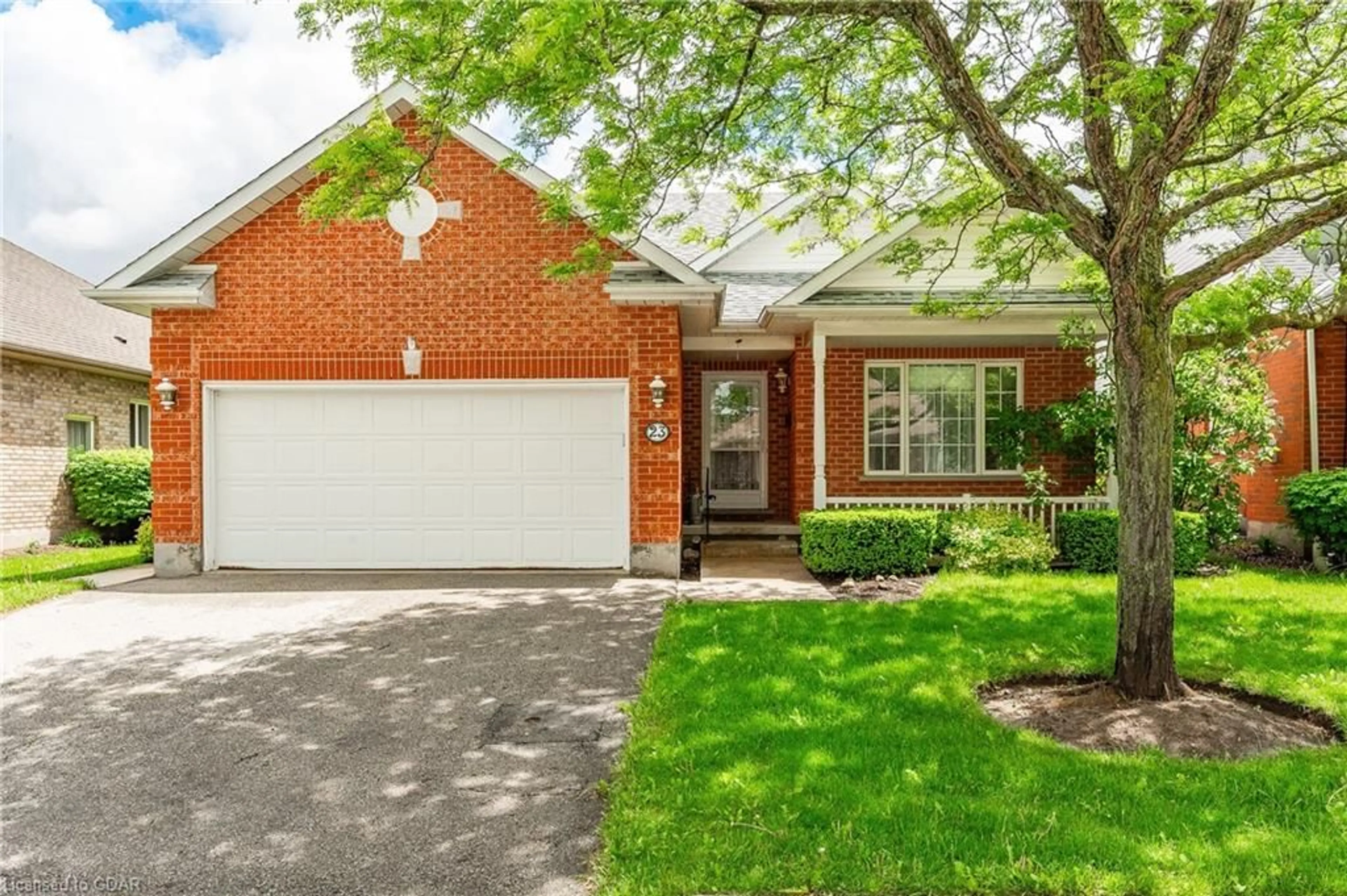 Home with brick exterior material for 23 Cherry Blossom Cir, Guelph Ontario N1G 4X7