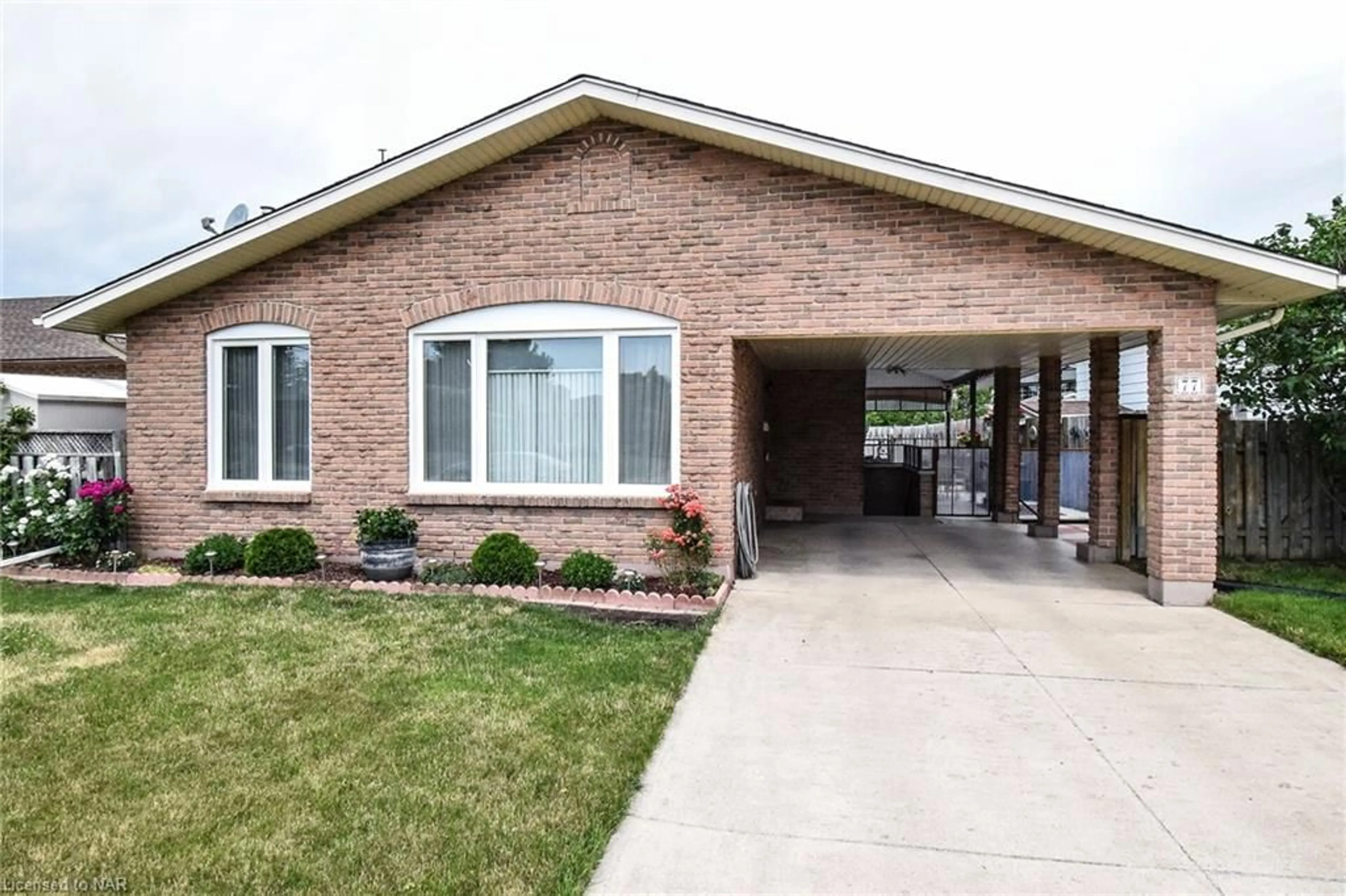 Home with brick exterior material for 77 Sherman Dr, St. Catharines Ontario L2N 2L6