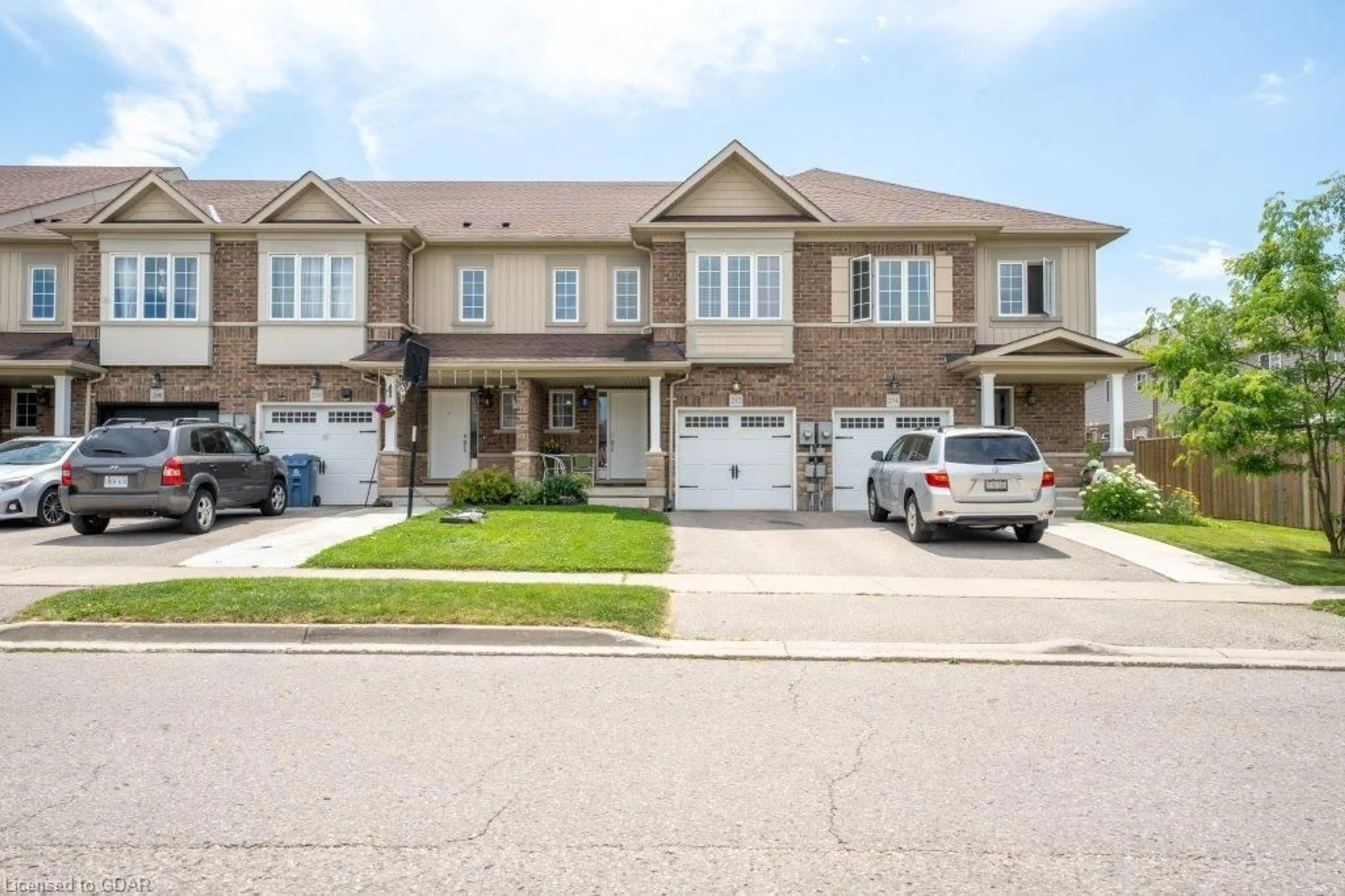 A pic from exterior of the house or condo for 212 Summit Ridge Drive, Guelph Ontario N1E 0L7