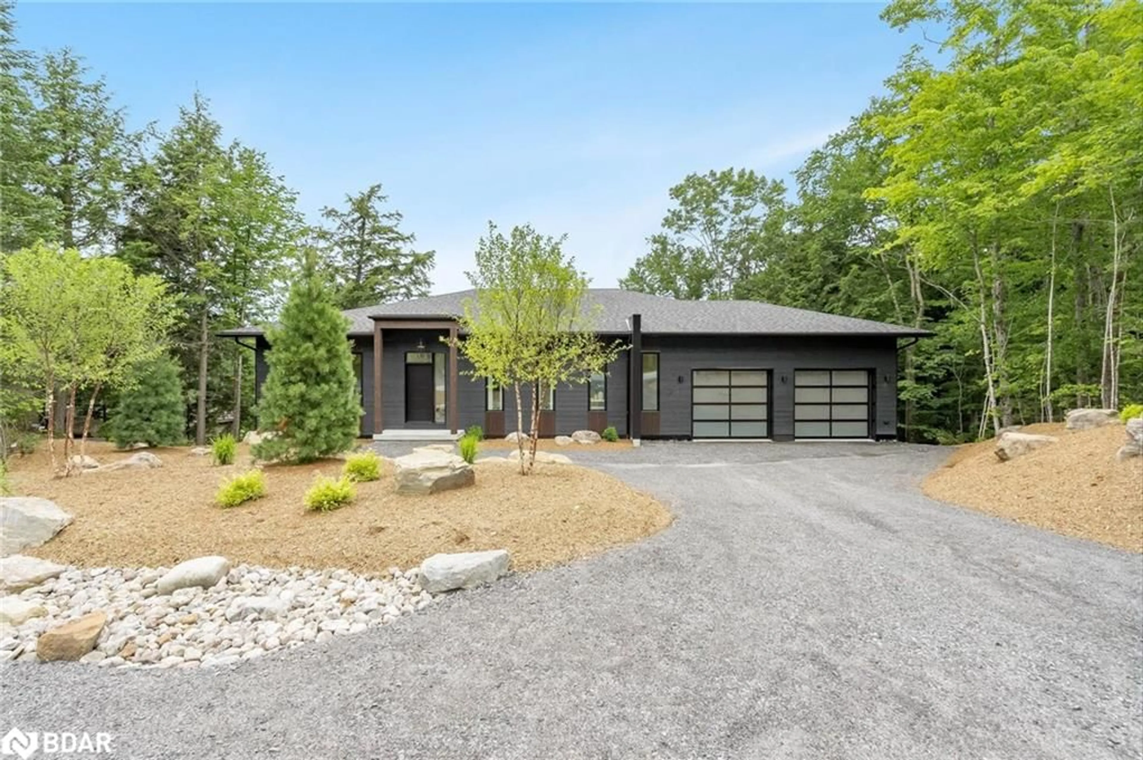 Frontside or backside of a home for 25 Deerhurst Highlands Dr, Huntsville Ontario P1H 1B1