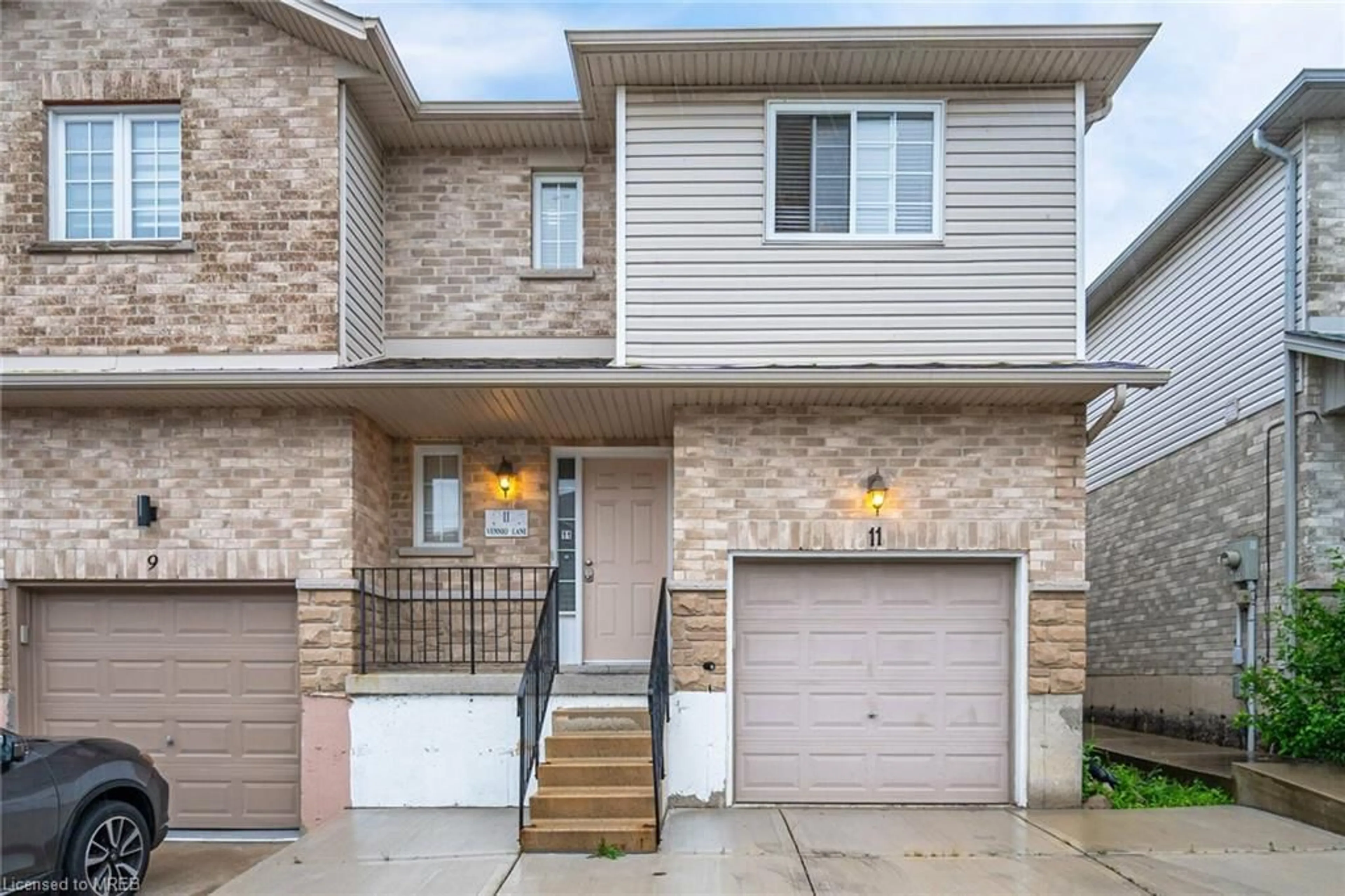 A pic from exterior of the house or condo for 11 Vennio Lane, Hamilton Ontario L9B 2Y7