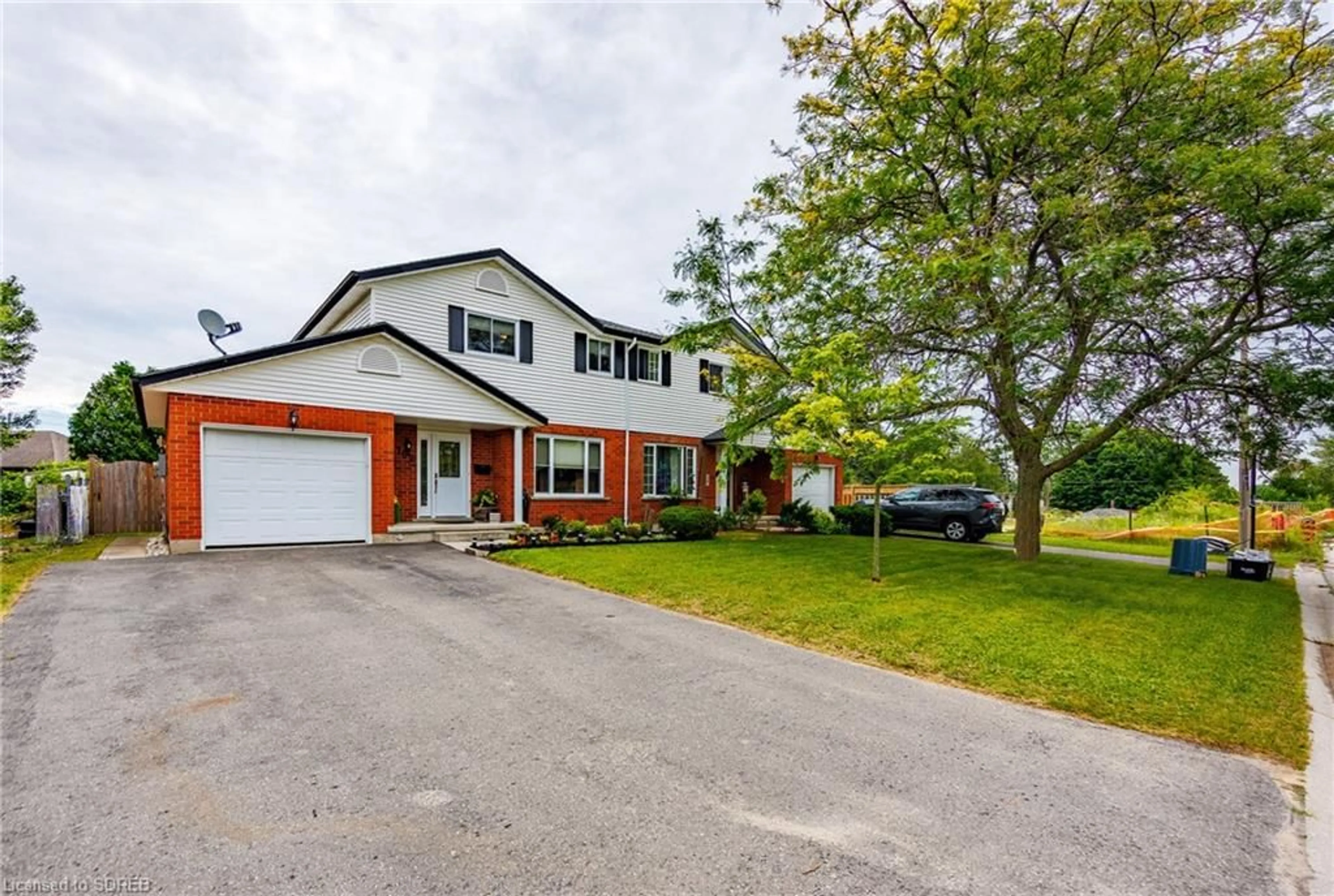 Frontside or backside of a home for 102 Austin Cres, Simcoe Ontario N3Y 5K7