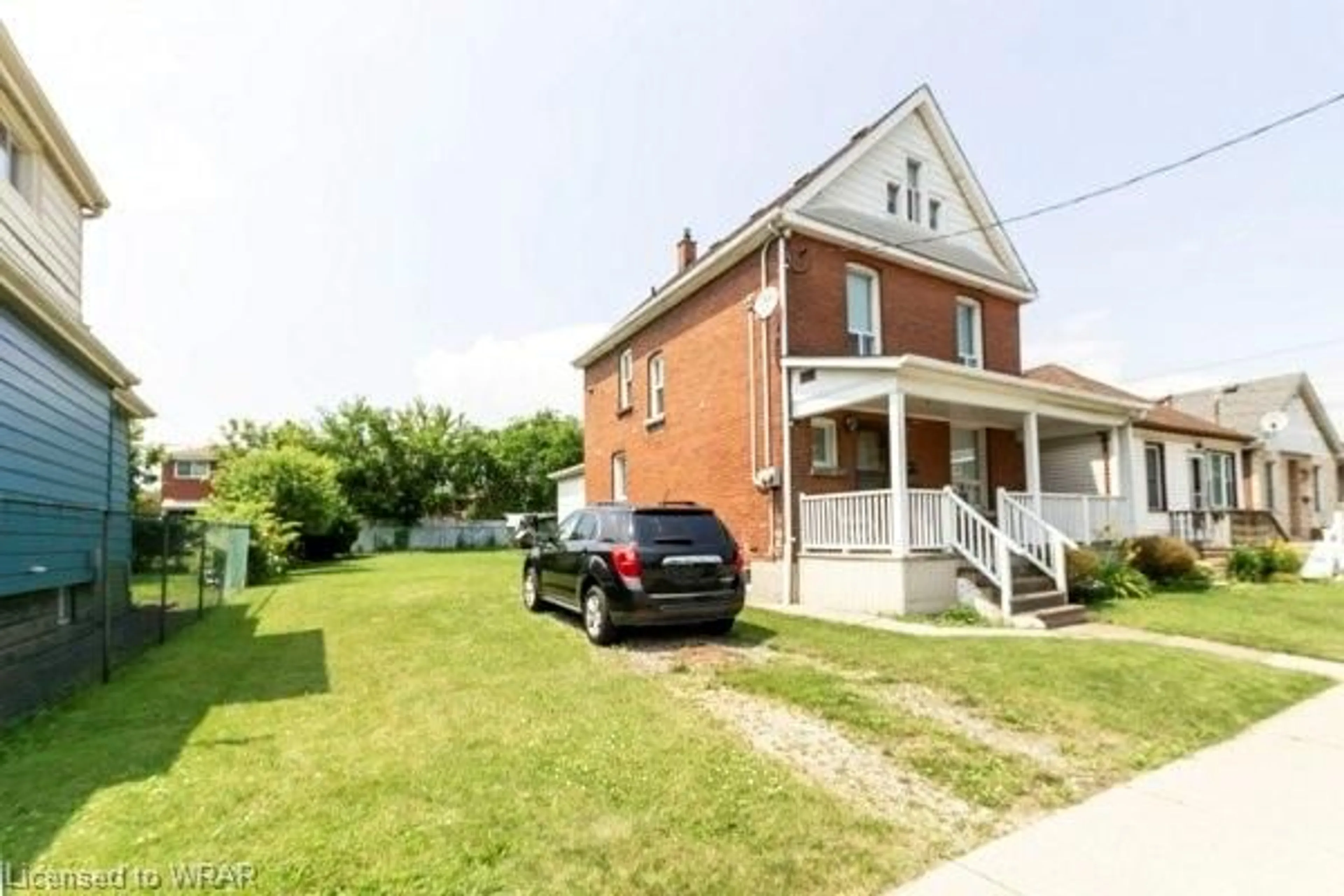 Frontside or backside of a home for 309 Weir St, Hamilton Ontario L8H 5G4