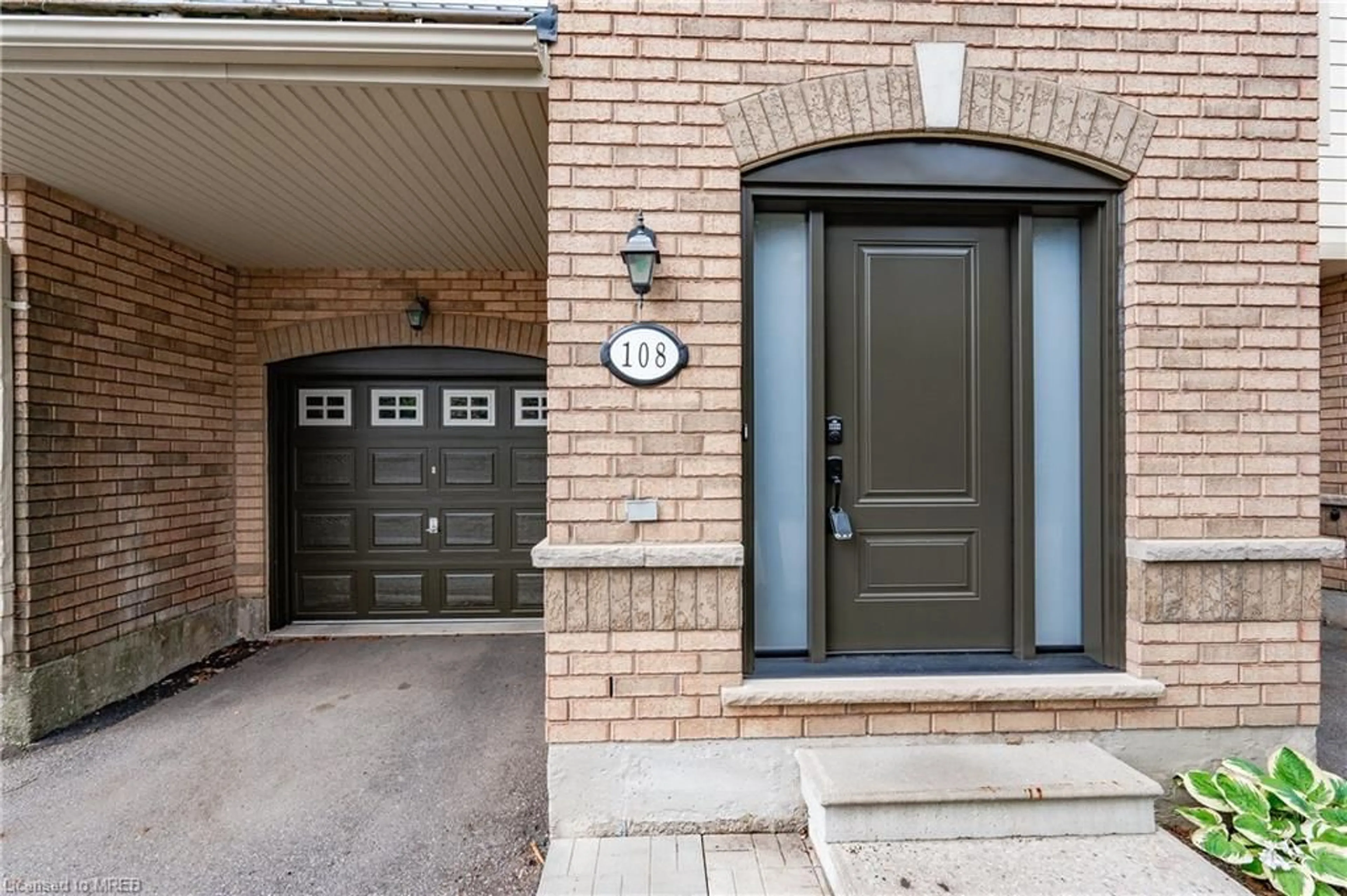 Home with brick exterior material for 620 Ferguson Dr #108, Milton Ontario L9T 0M6