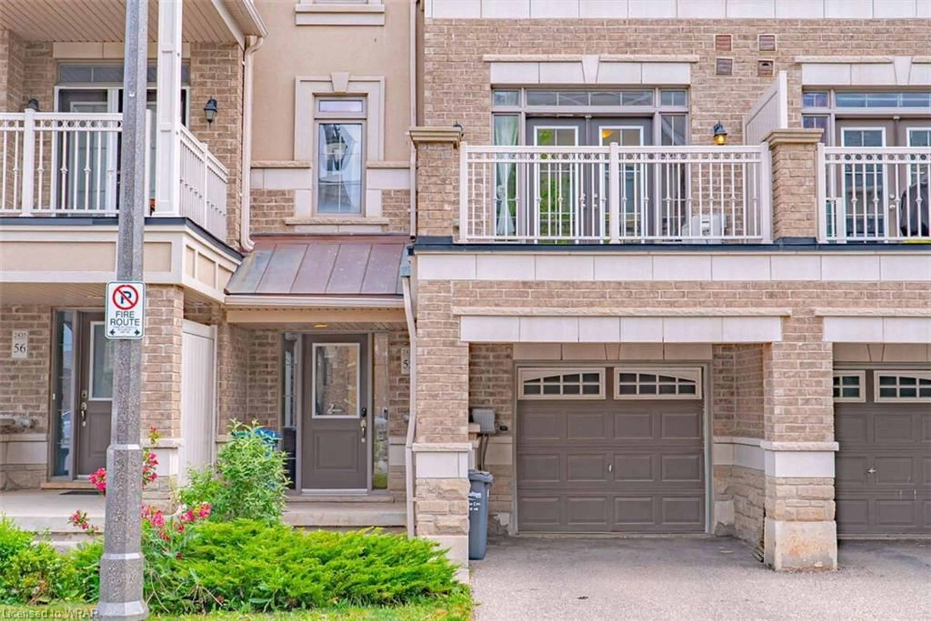 A pic from exterior of the house or condo, the street view for 2435 Greenwich Dr #55, Oakville Ontario L6M 0S4